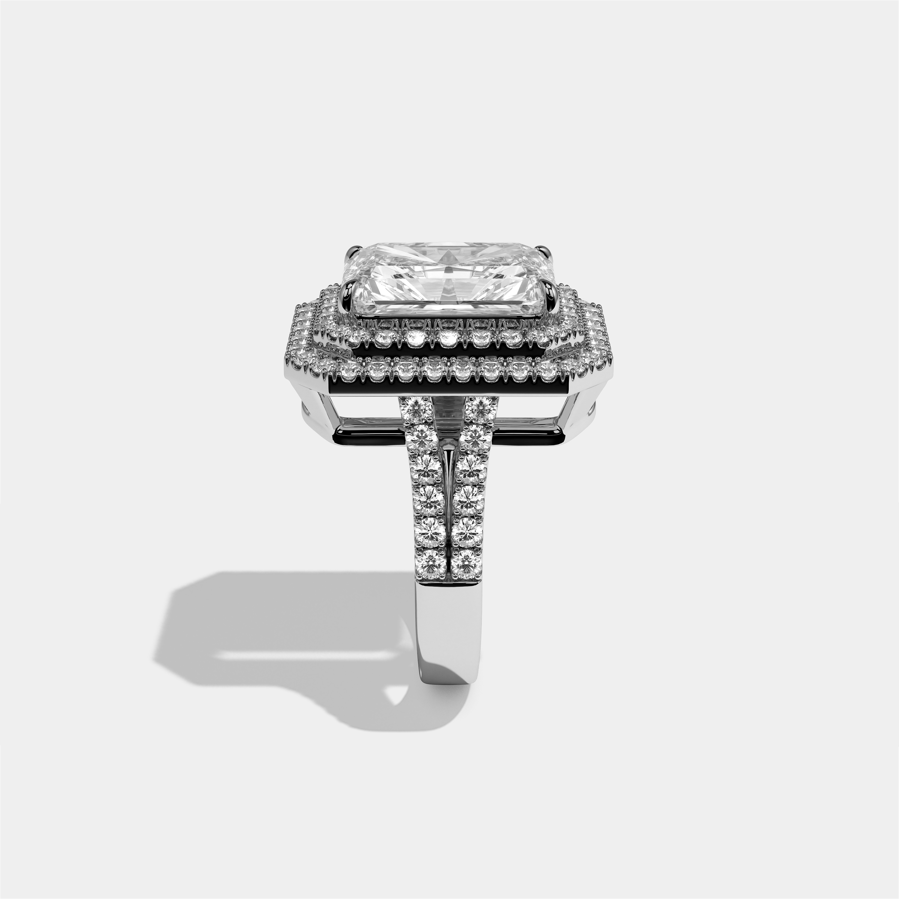 Cecilia Eleanor diamond radiant halo engagement ring in 18K white gold by Kurbãni Durjini, side view