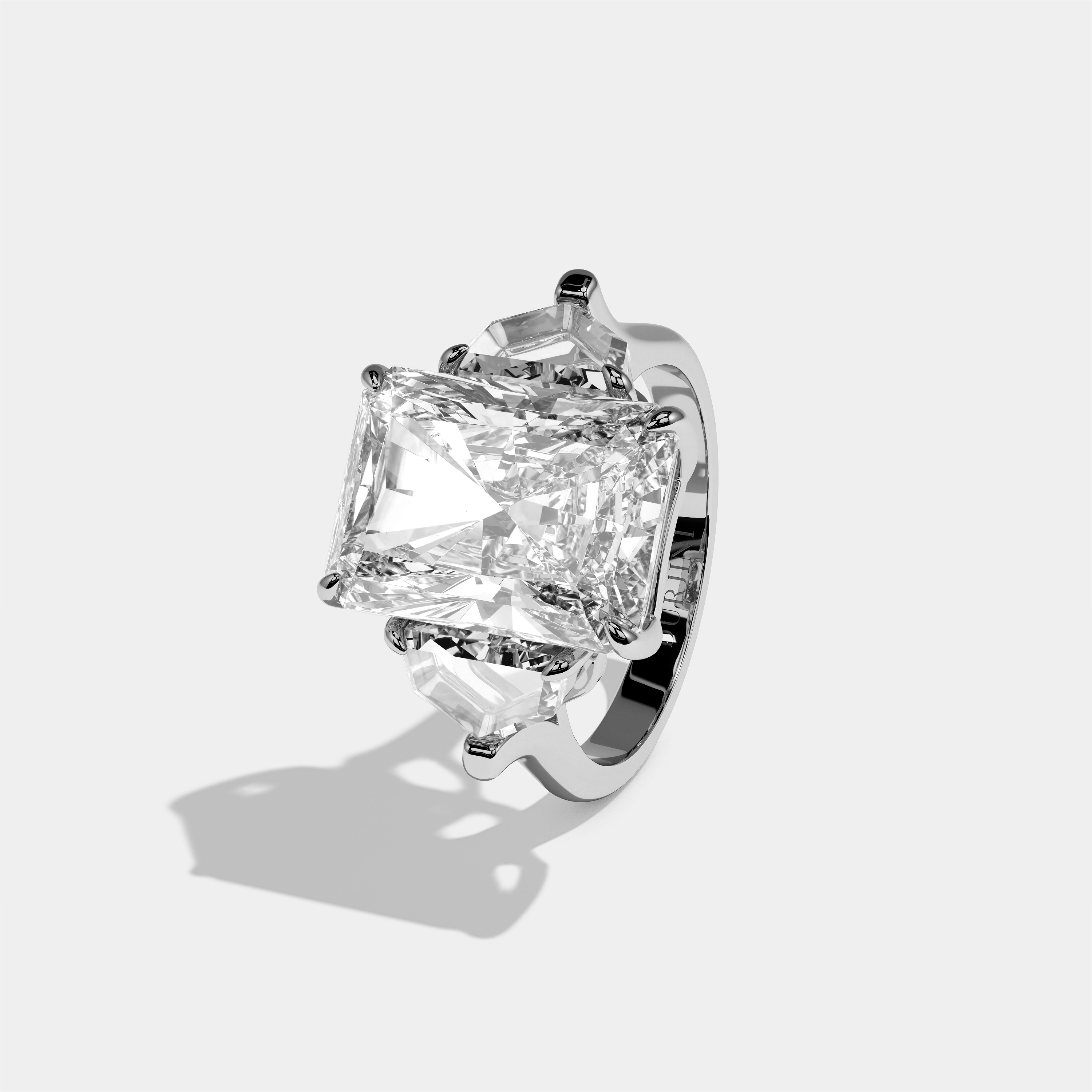 Philippa Rose diamond radiant engagement ring in 18K white gold by Kurbãni Durjini, left view