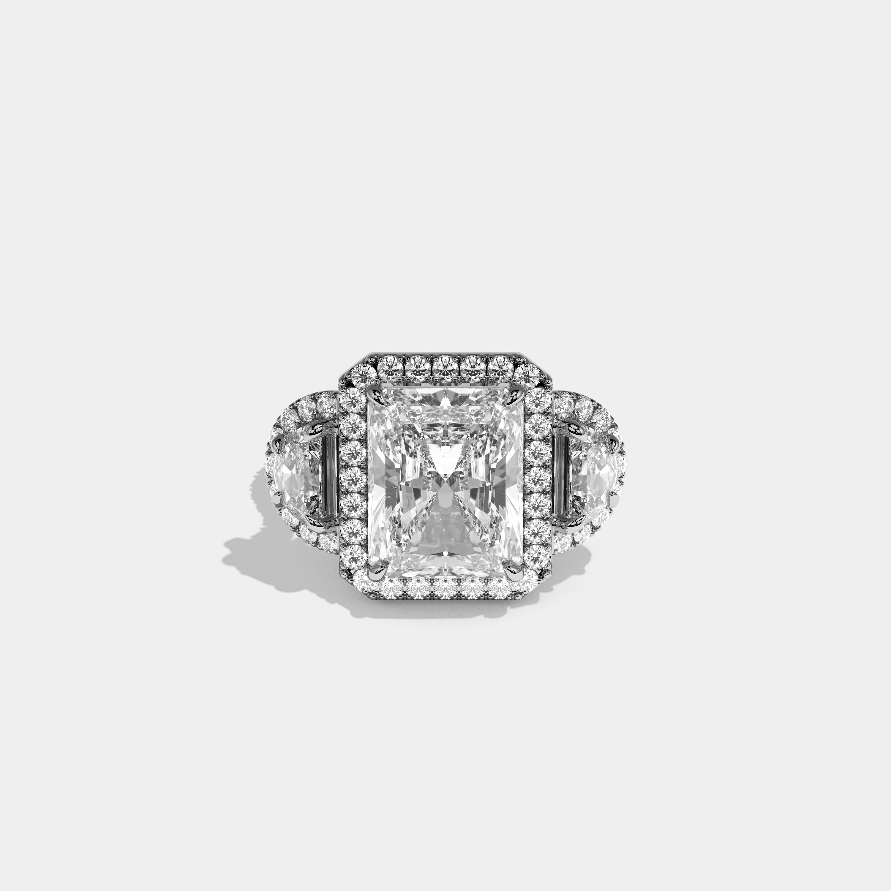 Aveline Godiva diamond radiant halo engagement ring in 18K white gold by Kurbãni Durjini, front view