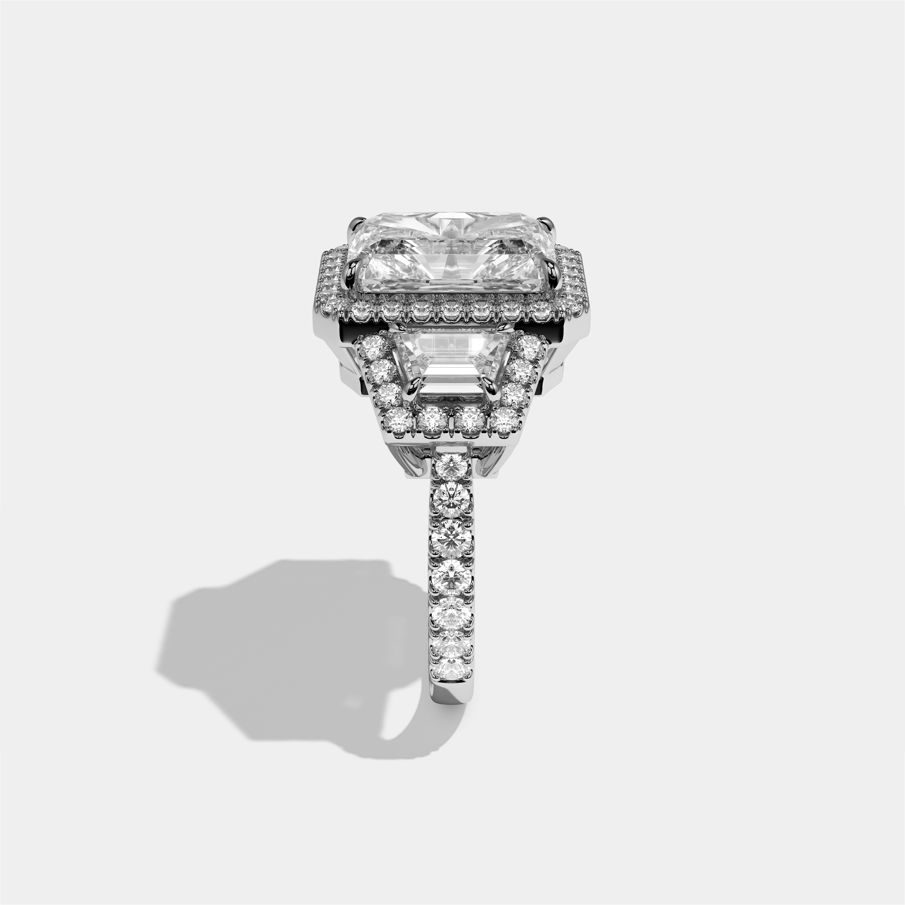 Bryony Everild diamond radiant halo engagement ring in 18K white gold by Kurbãni Durjini, side view