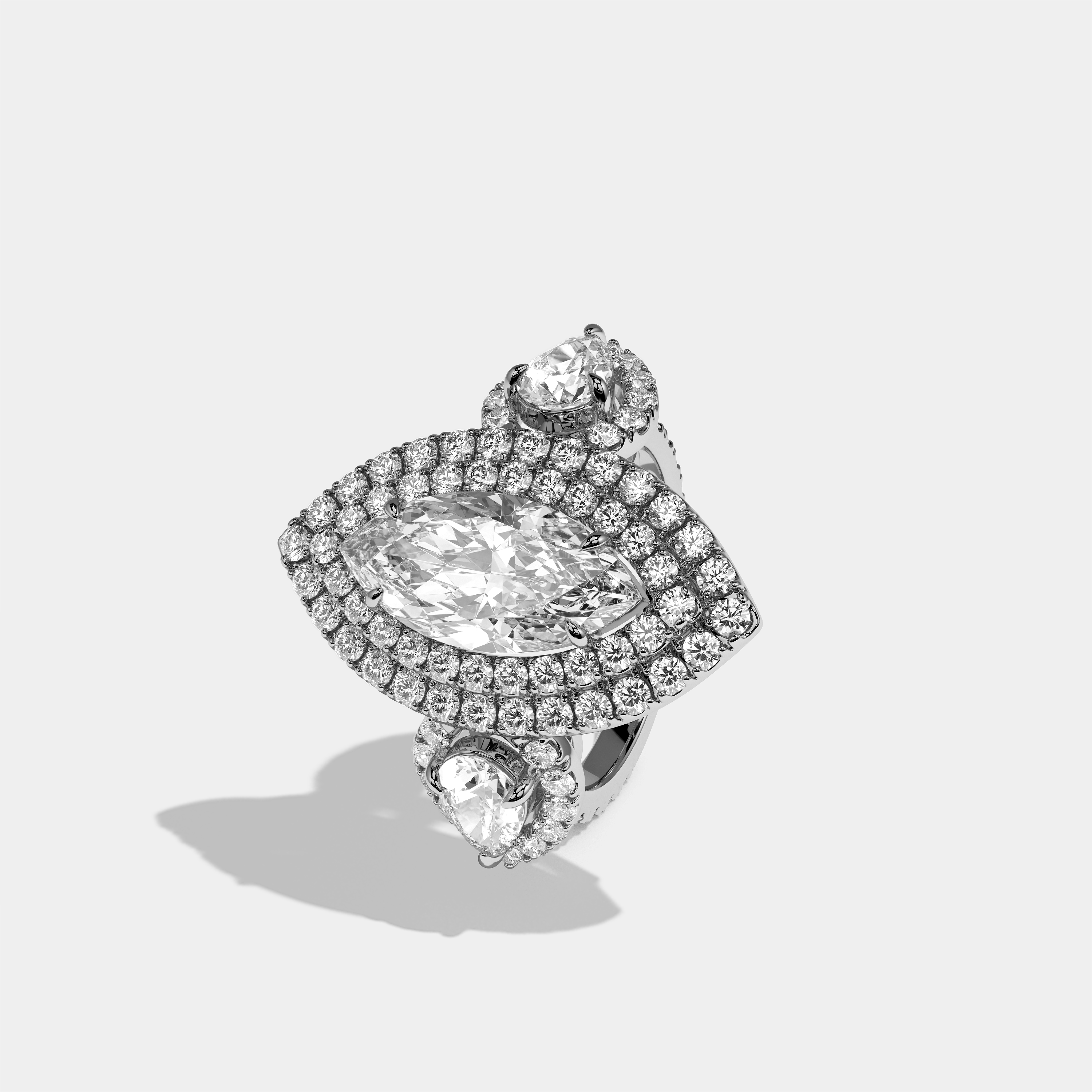 Drusilla Wexford diamond marquise halo engagement ring in 18K white gold by Kurbãni Durjini, left view