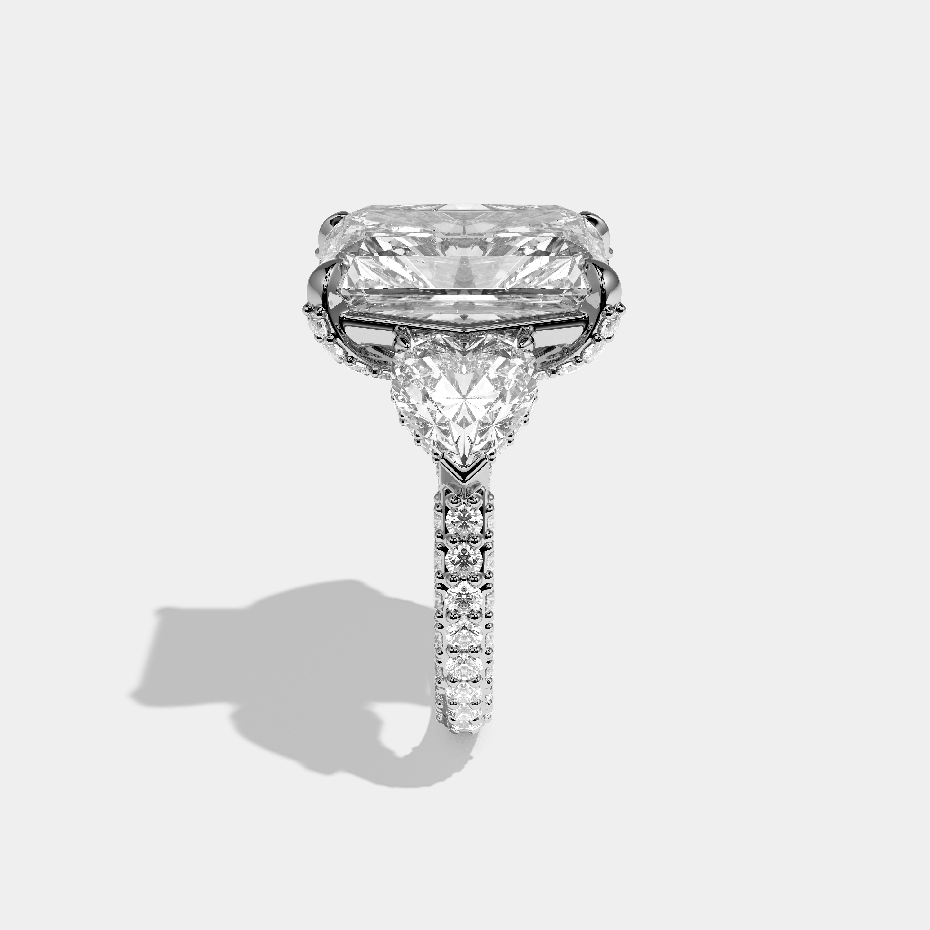 Chaya diamond radiant halo ring in 18K white gold by Kurbãni Durjini, side view