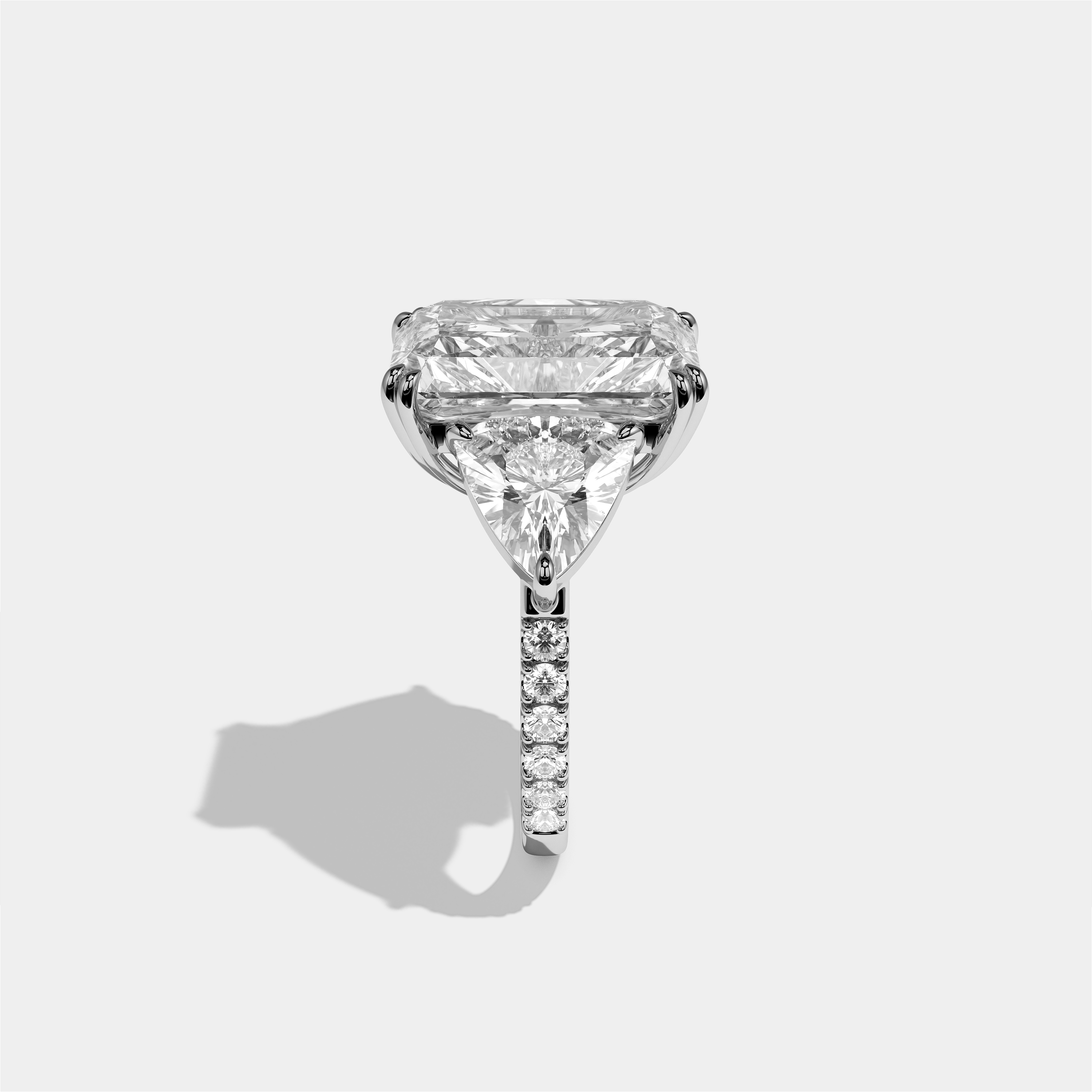 Tzipporah diamond radiant halo engagement ring in 18K white gold by Kurbãni Durjini, side view