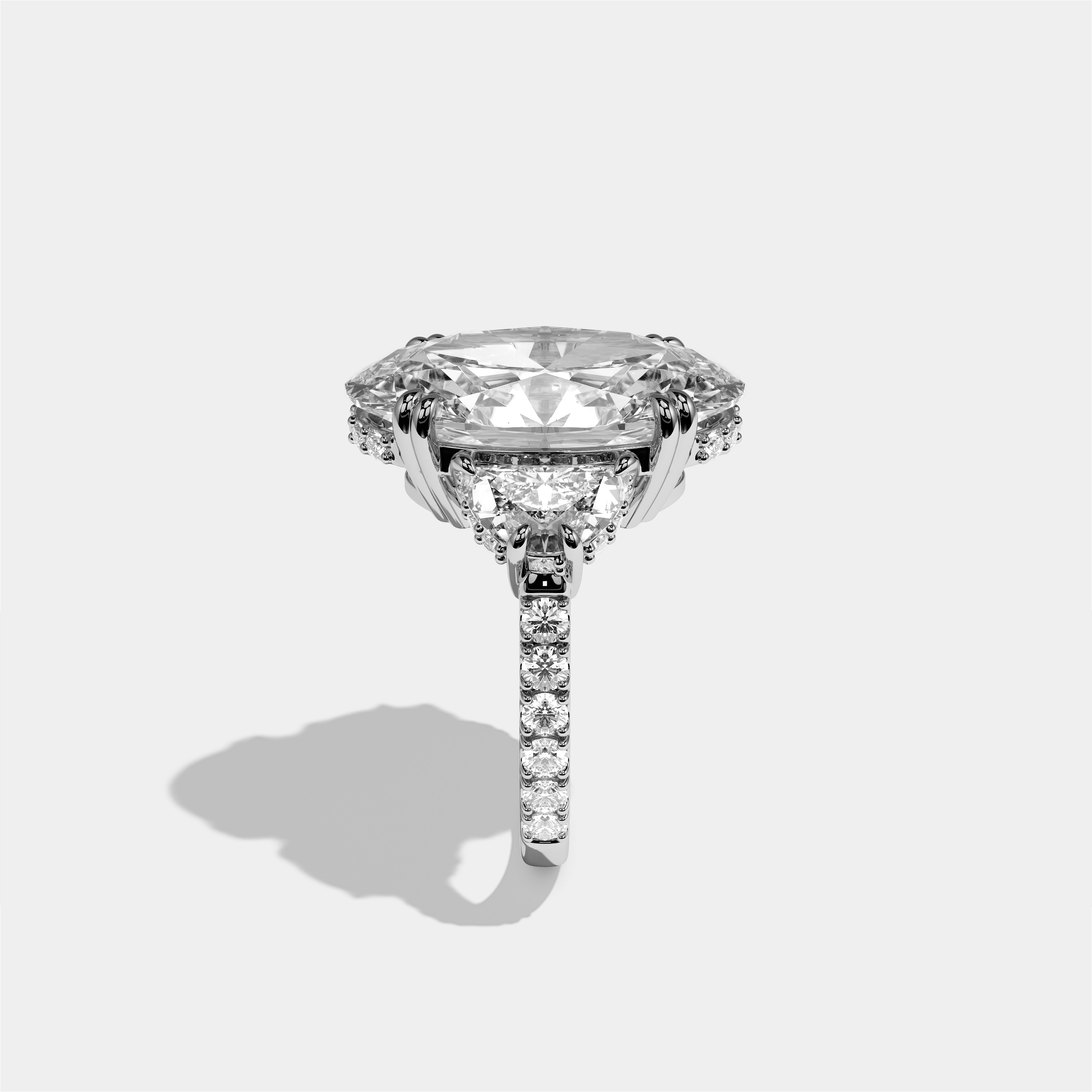 Leah diamond oval halo engagement ring in 18K white gold by Kurbãni Durjini, side view