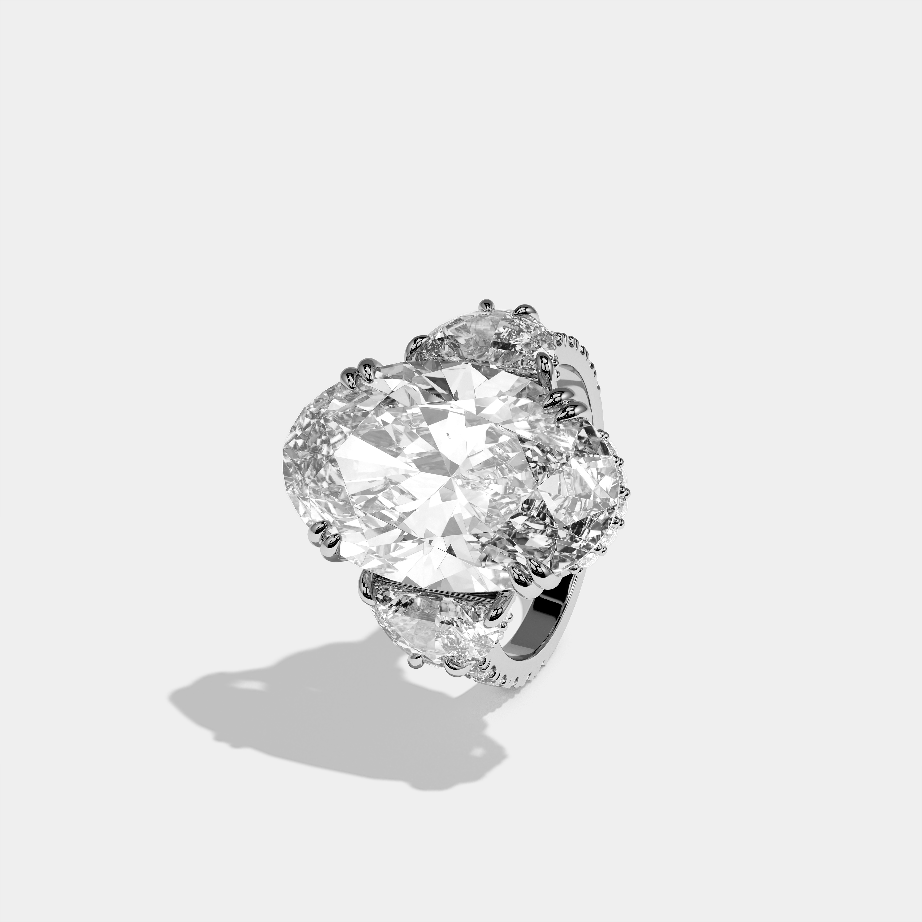 Leah diamond oval halo engagement ring in 18K white gold by Kurbãni Durjini, left view