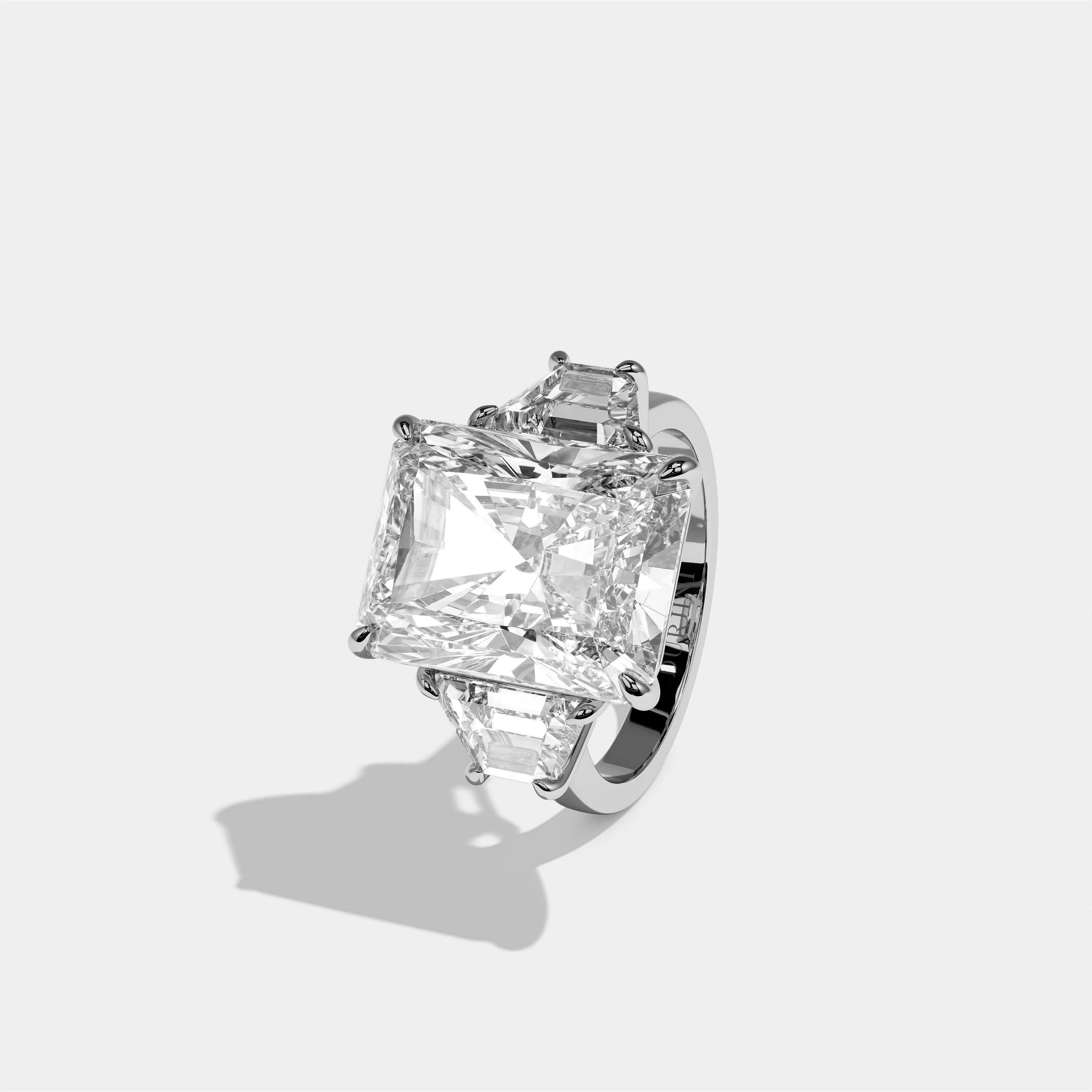 Shira diamond radiant halo engagement ring in 18K white gold by Kurbãni Durjini, left view
