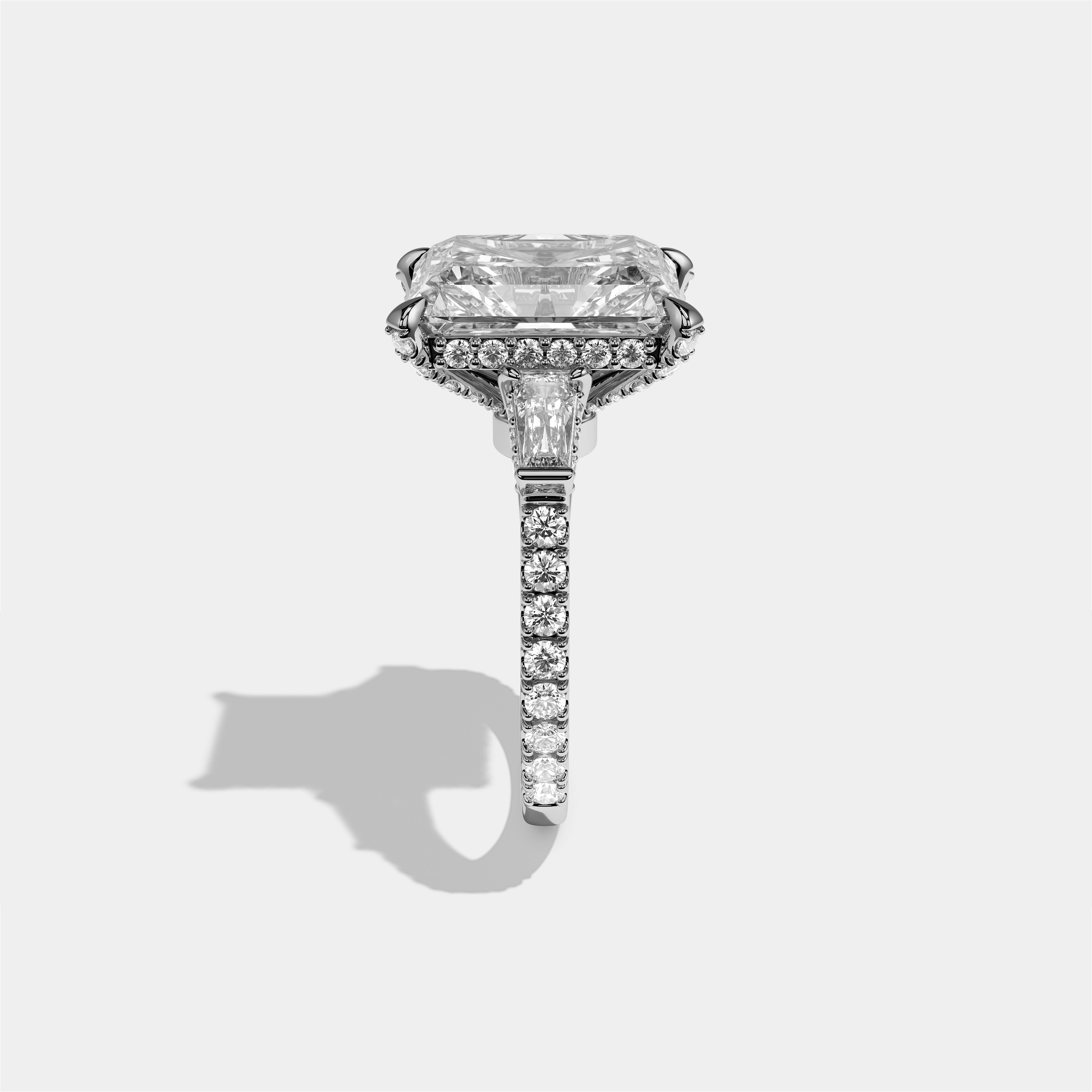 Esther Eclat diamond radiant halo engagement ring in 18K white gold by Kurbãni Durjini, side view