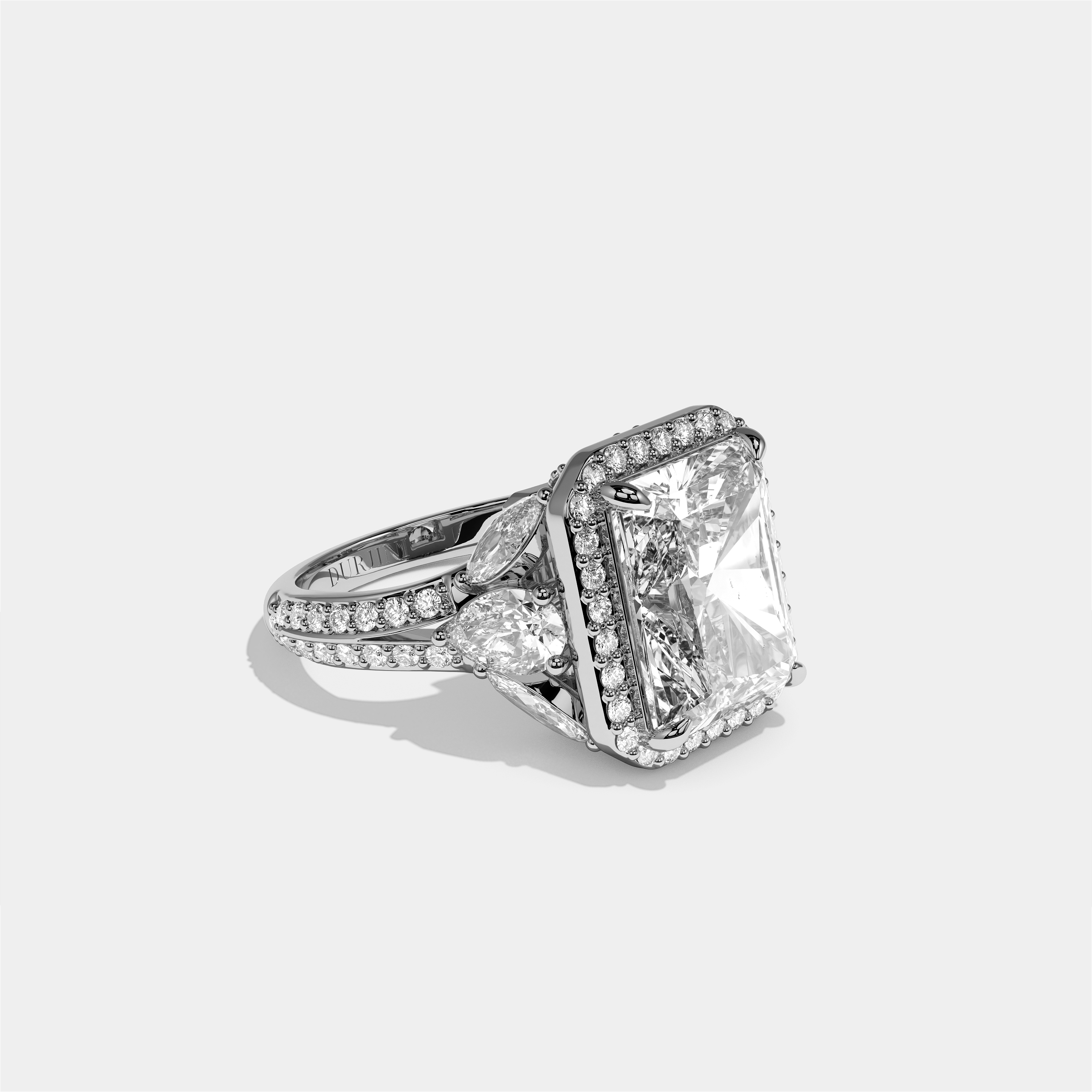 Rina Eclat diamond radiant halo engagement ring in 18K white gold by Kurbãni Durjini, right view