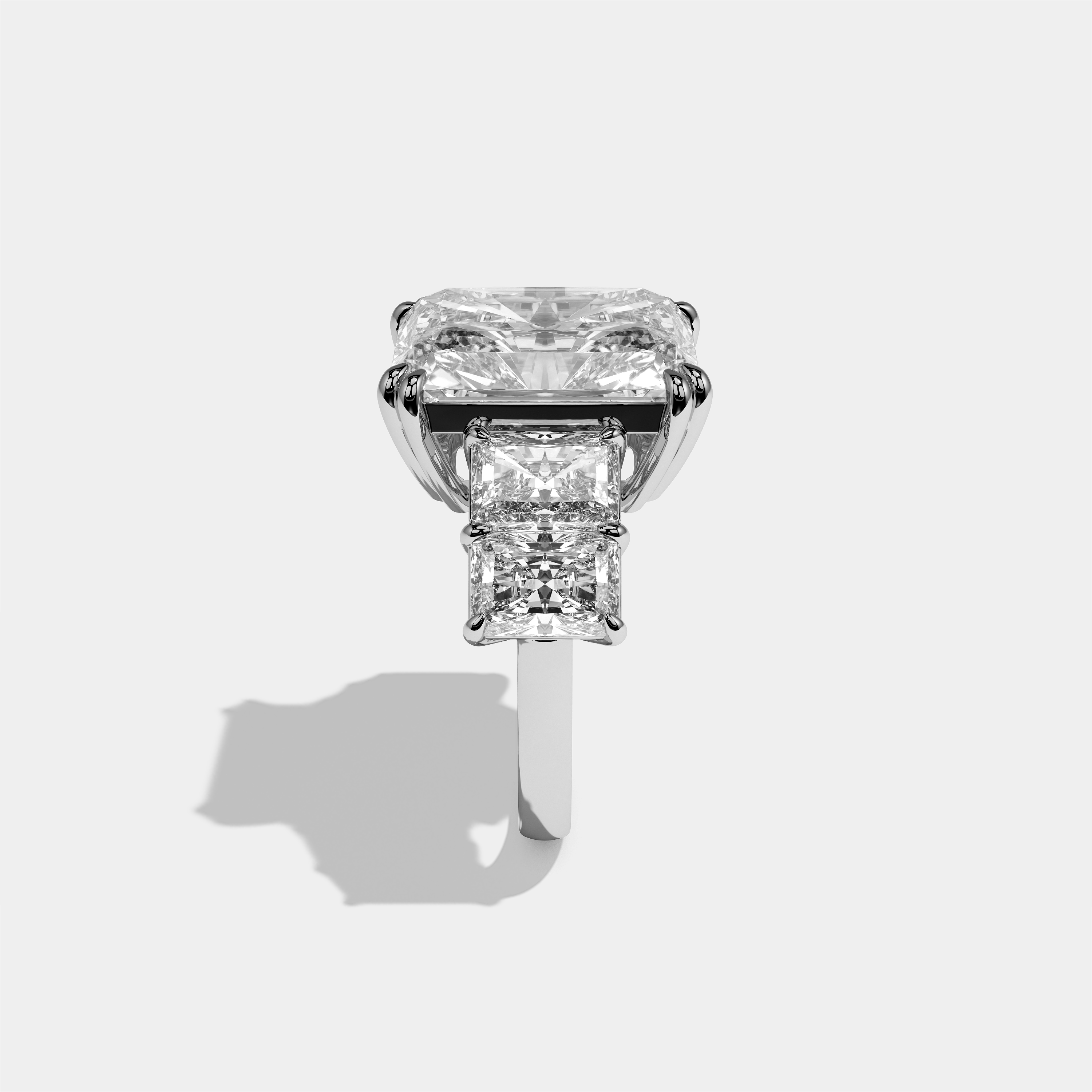 Hila diamond radiant halo engagement ring in 18K white gold by Kurbãni Durjini, side view