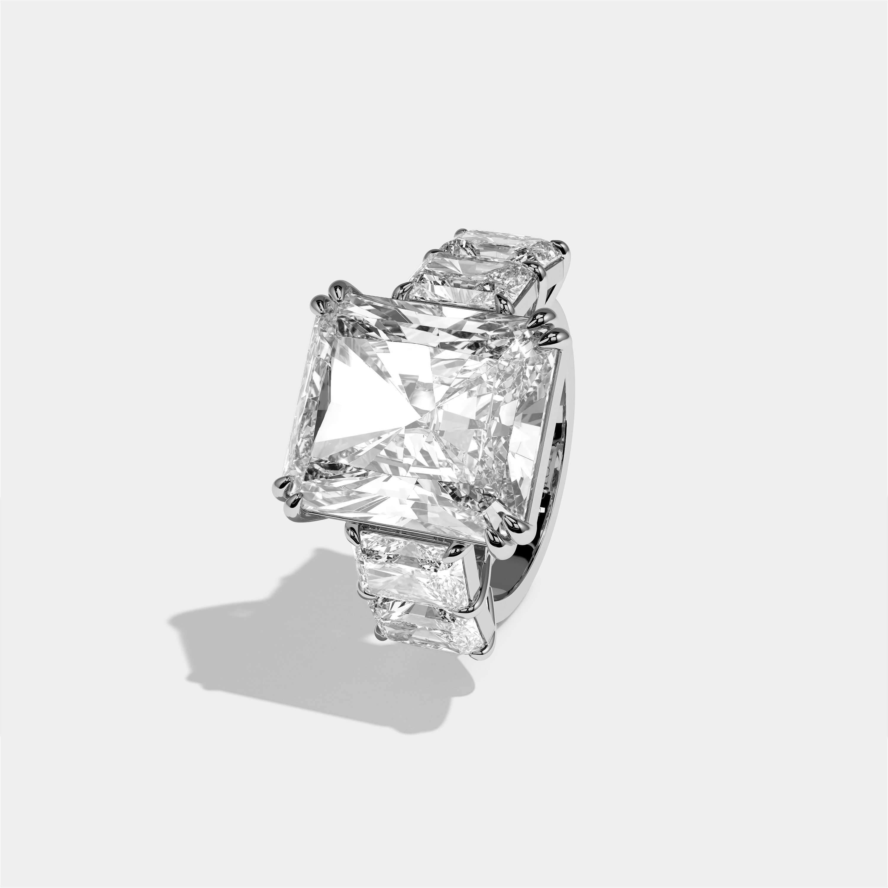 Hila diamond radiant halo engagement ring in 18K white gold by Kurbãni Durjini, left view