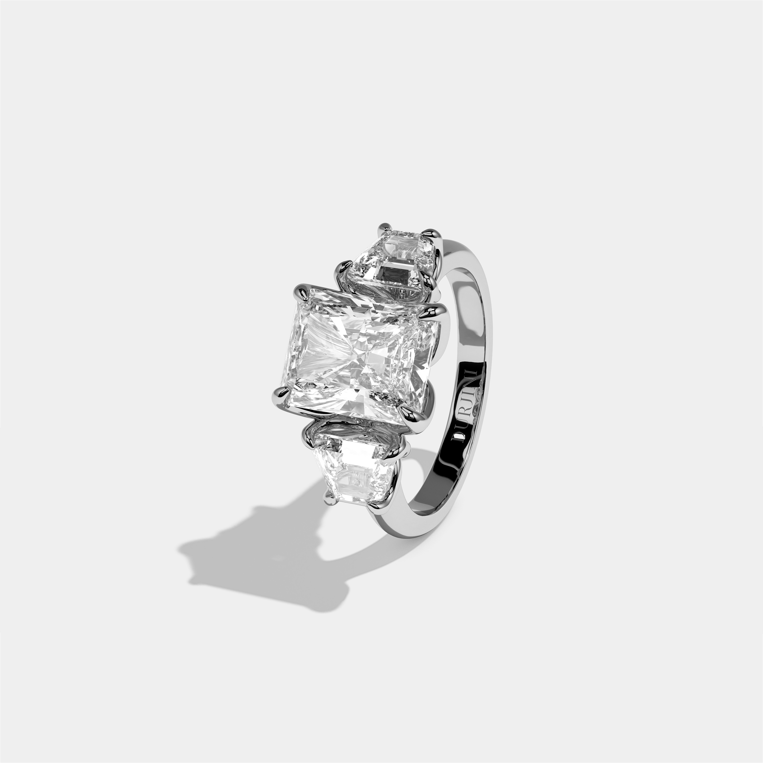 Yehudit diamond radiant halo engagement ring in 18K white gold by Kurbãni Durjini, left view
