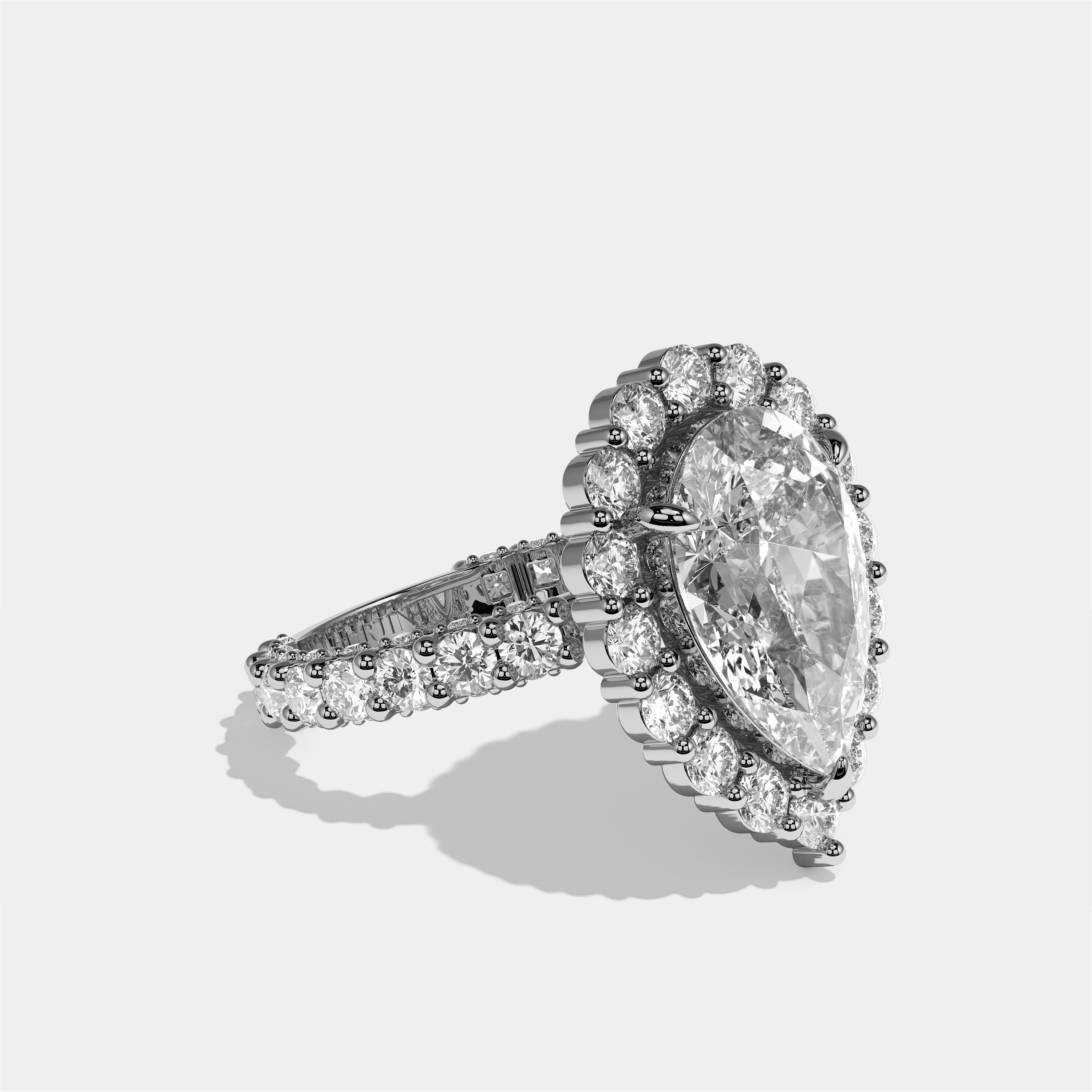 Judith diamond pear halo engagement ring in 18K white gold by Kurbãni Durjini, right view