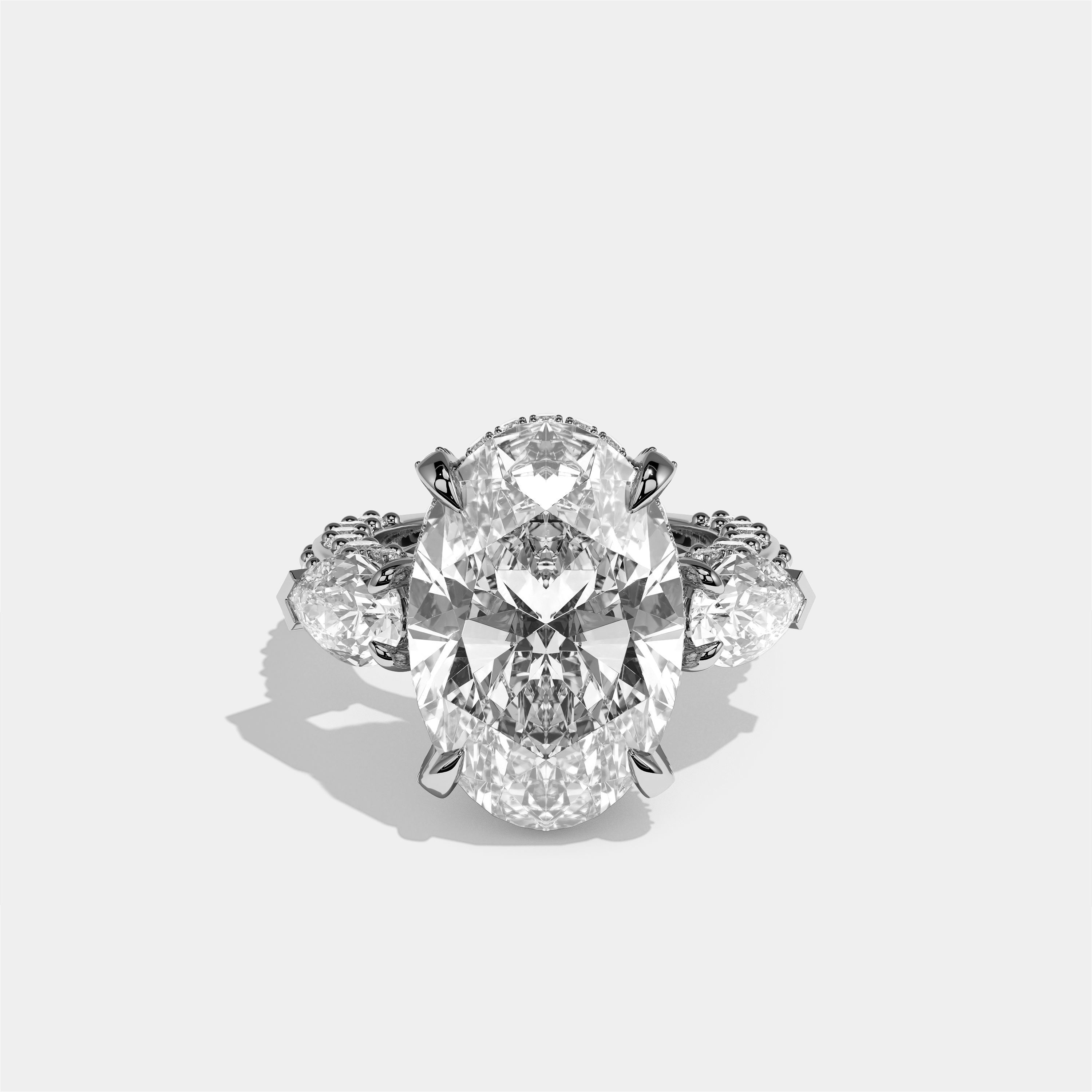 Shira diamond oval halo engagement ring in 18K white gold by Kurbãni Durjini, front view