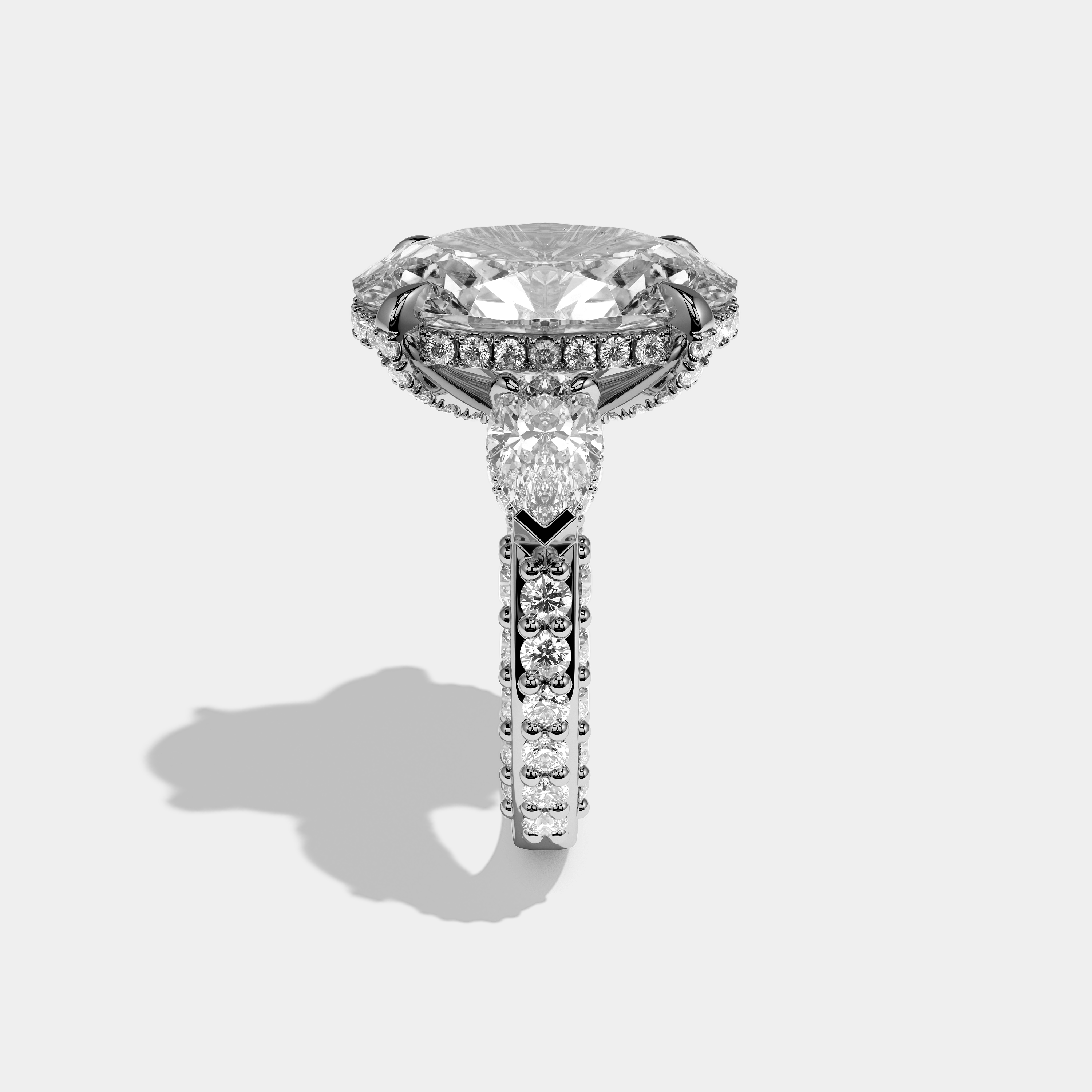 Shira diamond oval halo engagement ring in 18K white gold by Kurbãni Durjini, side view
