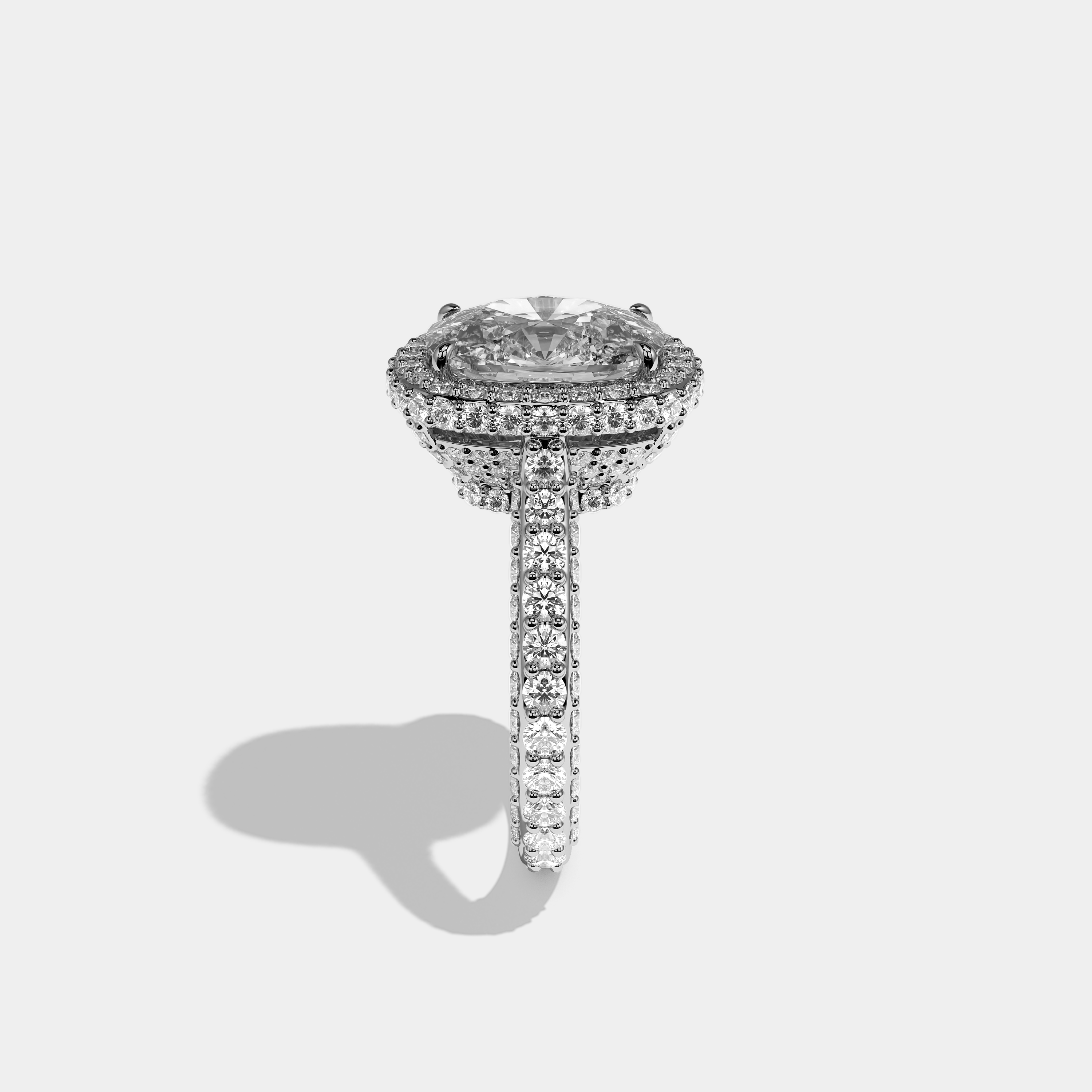 Shira diamond cushion halo engagement ring in 18K white gold by Kurbãni Durjini, side view