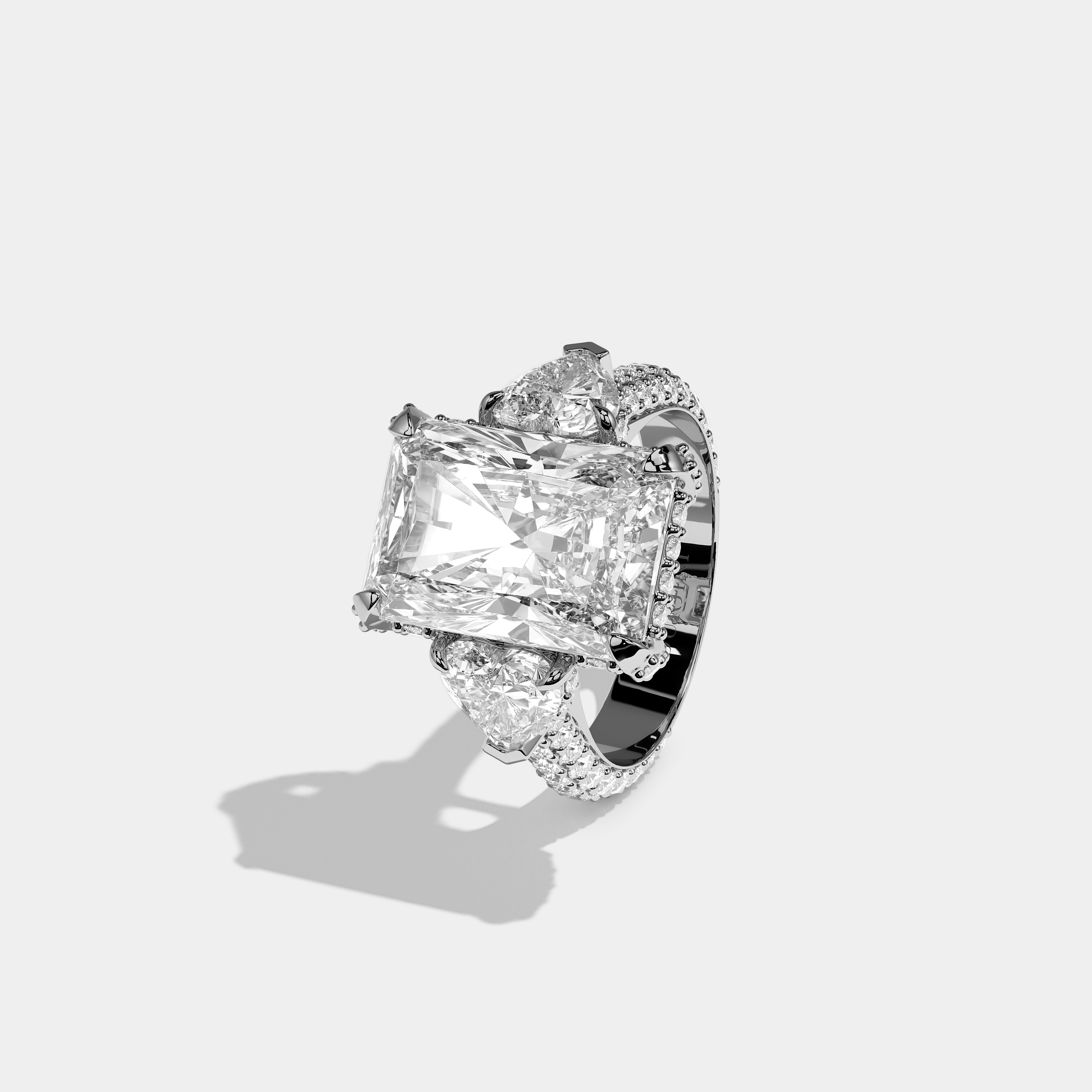 Luna 12.00ct diamond radiant halo engagement ring in 18K white gold by Kurbãni Durjini, left view