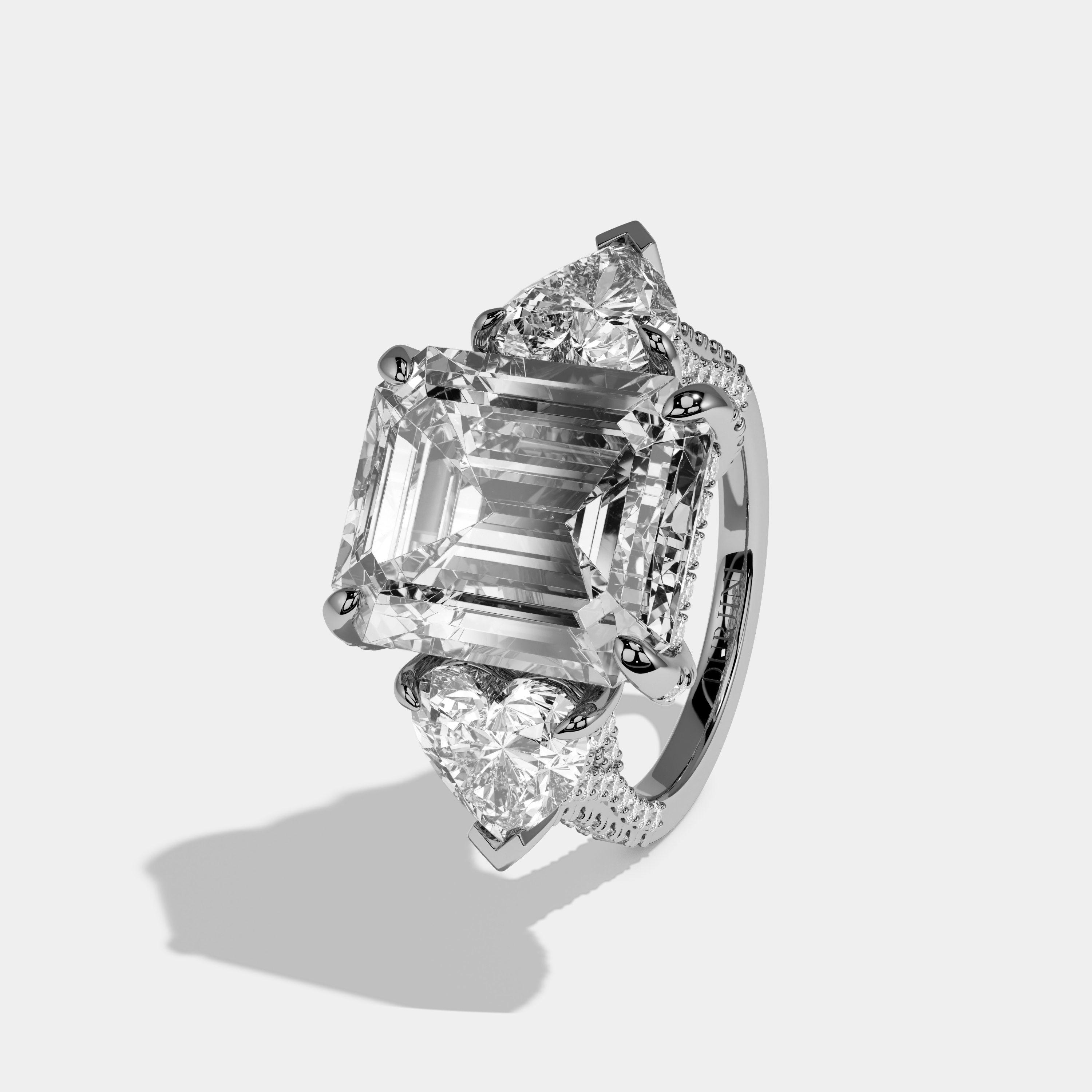 Alexandra Emerald Cut Diamond Halo With Twin Heart Sides Engagement Ring 10ct 18k White Gold