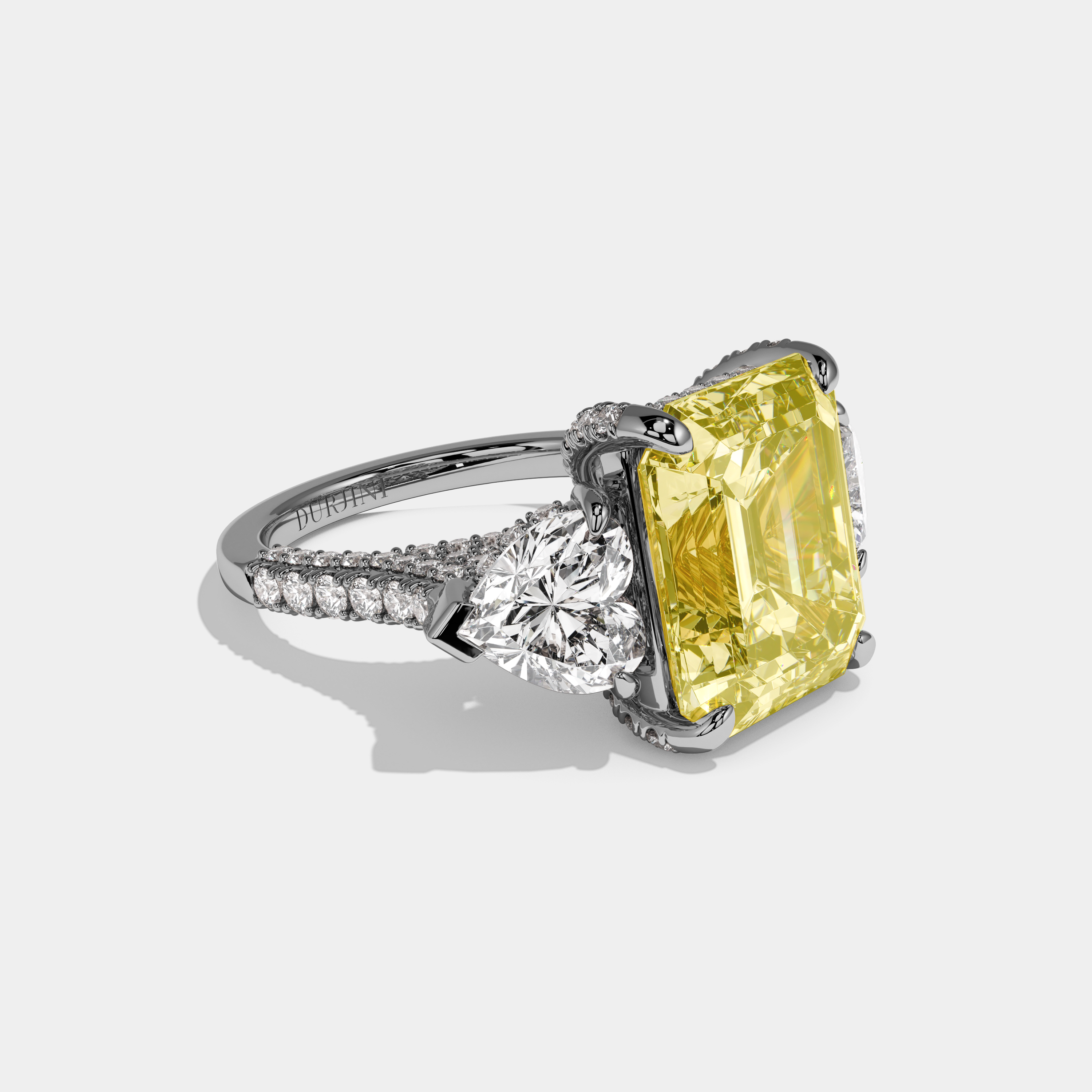 Alexandra Fancy Yellow Emerald Cut Diamond Halo With Twin Heart Sides Engagement Ring 10ct 18k White Gold