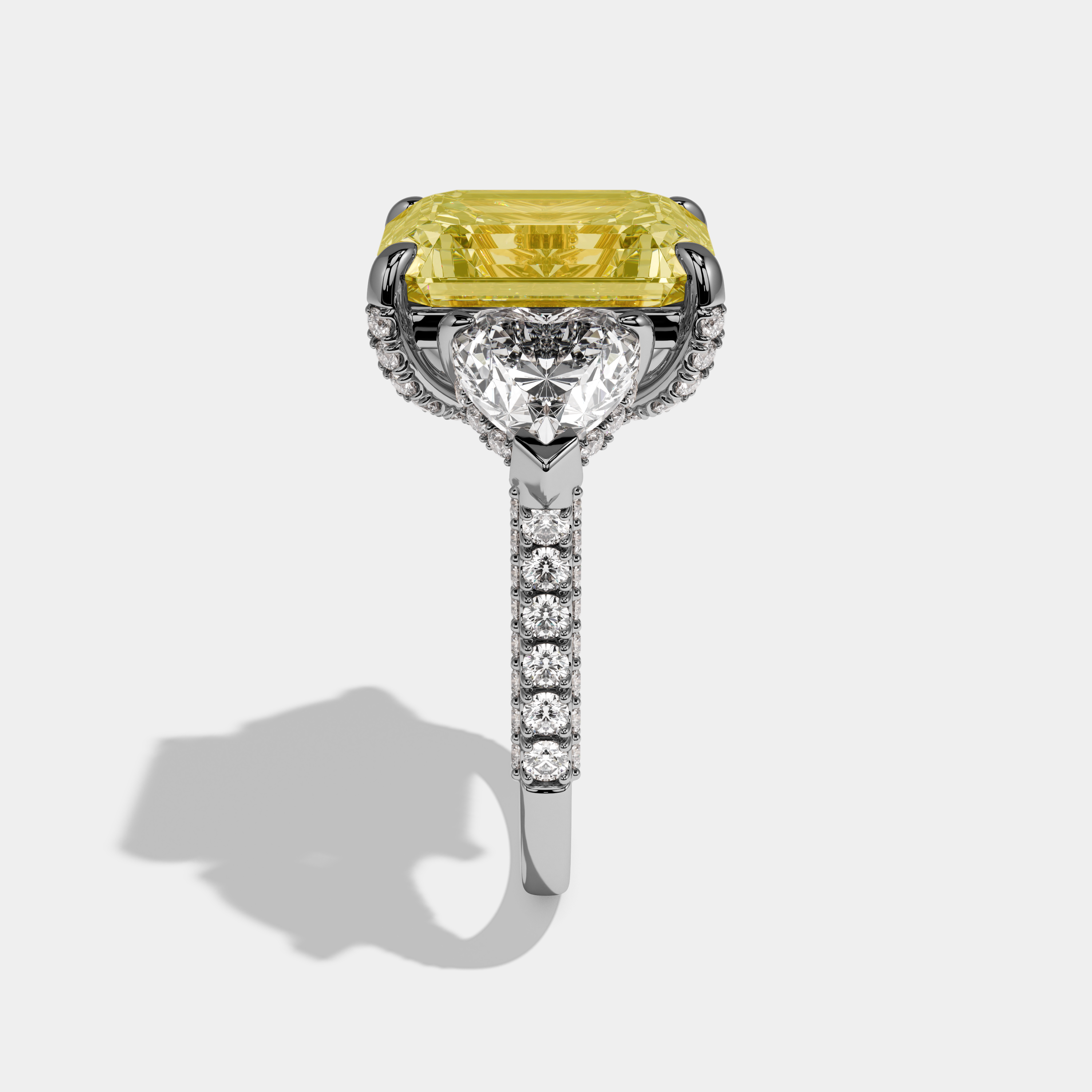 Alexandra Fancy Yellow Emerald Cut Diamond Halo With Twin Heart Sides Engagement Ring 10ct 18k White Gold