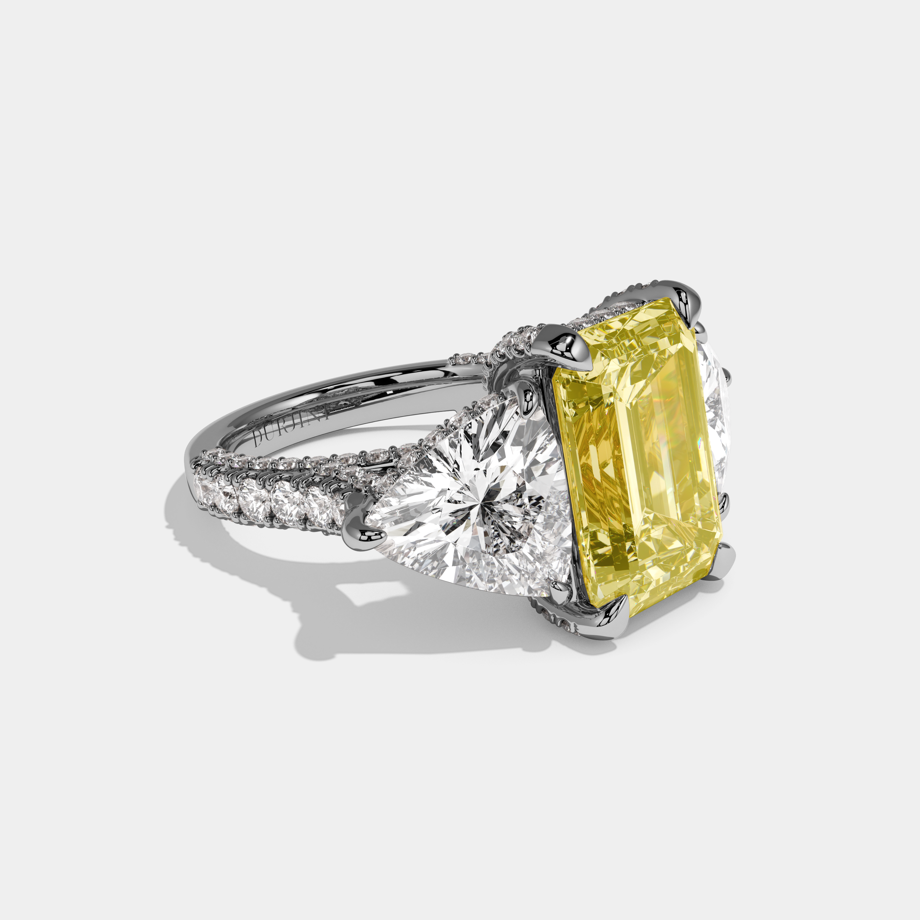 Charlotte Fancy Yellow Emerald Cut Diamond Band With Trillion Cut Sides Engagement Ring 10ct 18k White Gold