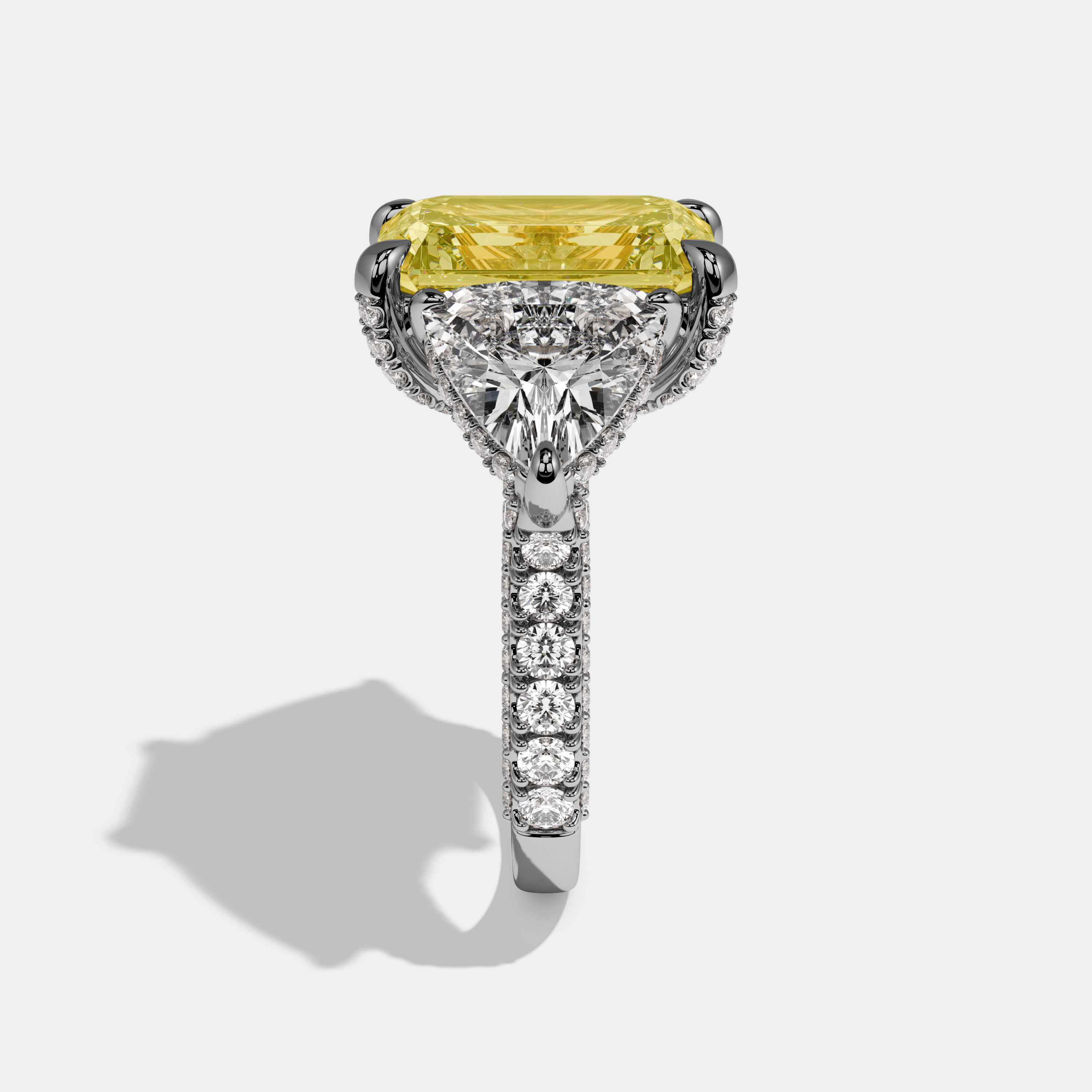 Charlotte Fancy Yellow Emerald Cut Diamond Band With Trillion Cut Sides Engagement Ring 10ct 18k White Gold