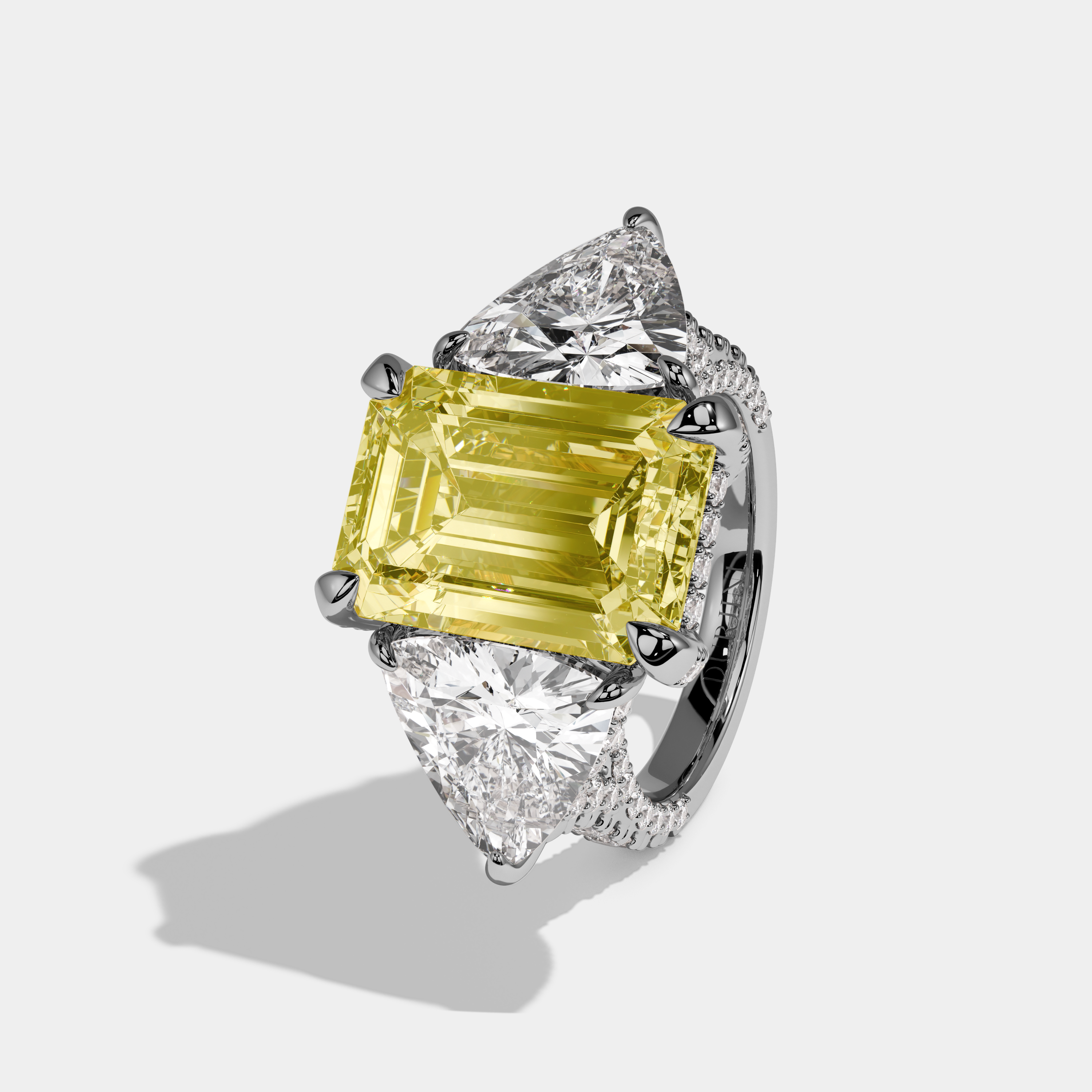 Charlotte Fancy Yellow Emerald Cut Diamond Band With Trillion Cut Sides Engagement Ring 10ct 18k White Gold