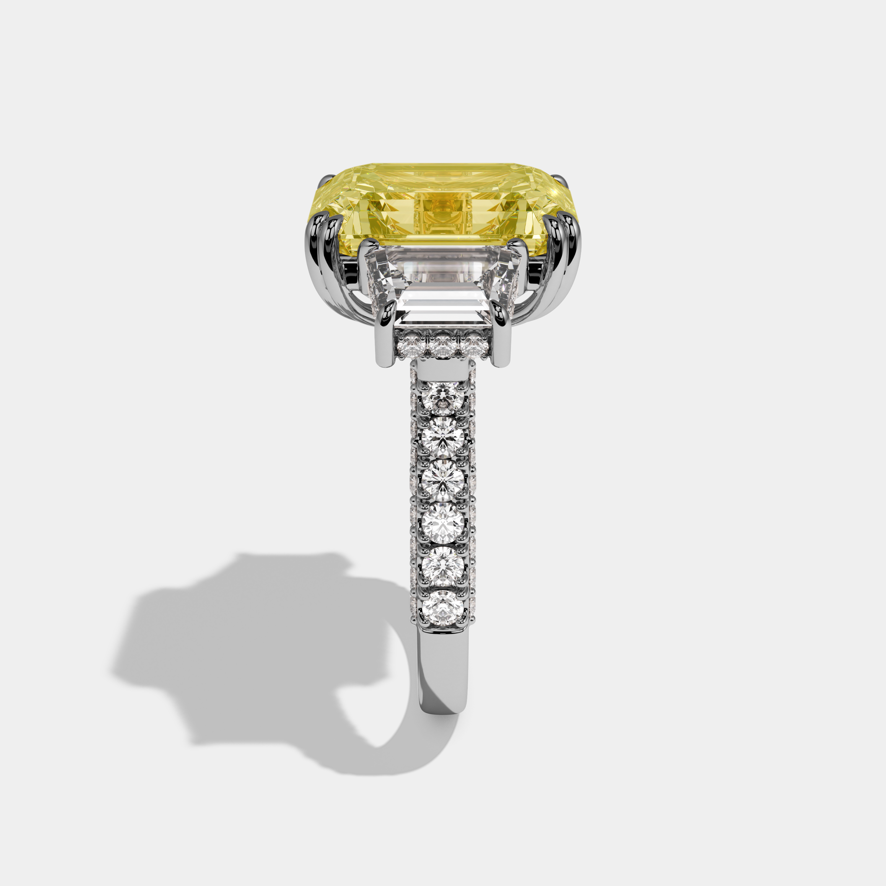 Catherine Fancy Yellow Emerald Cut Diamond Halo With Step Cut Side Diamond Band Engagement Ring 10ct 18k White Gold