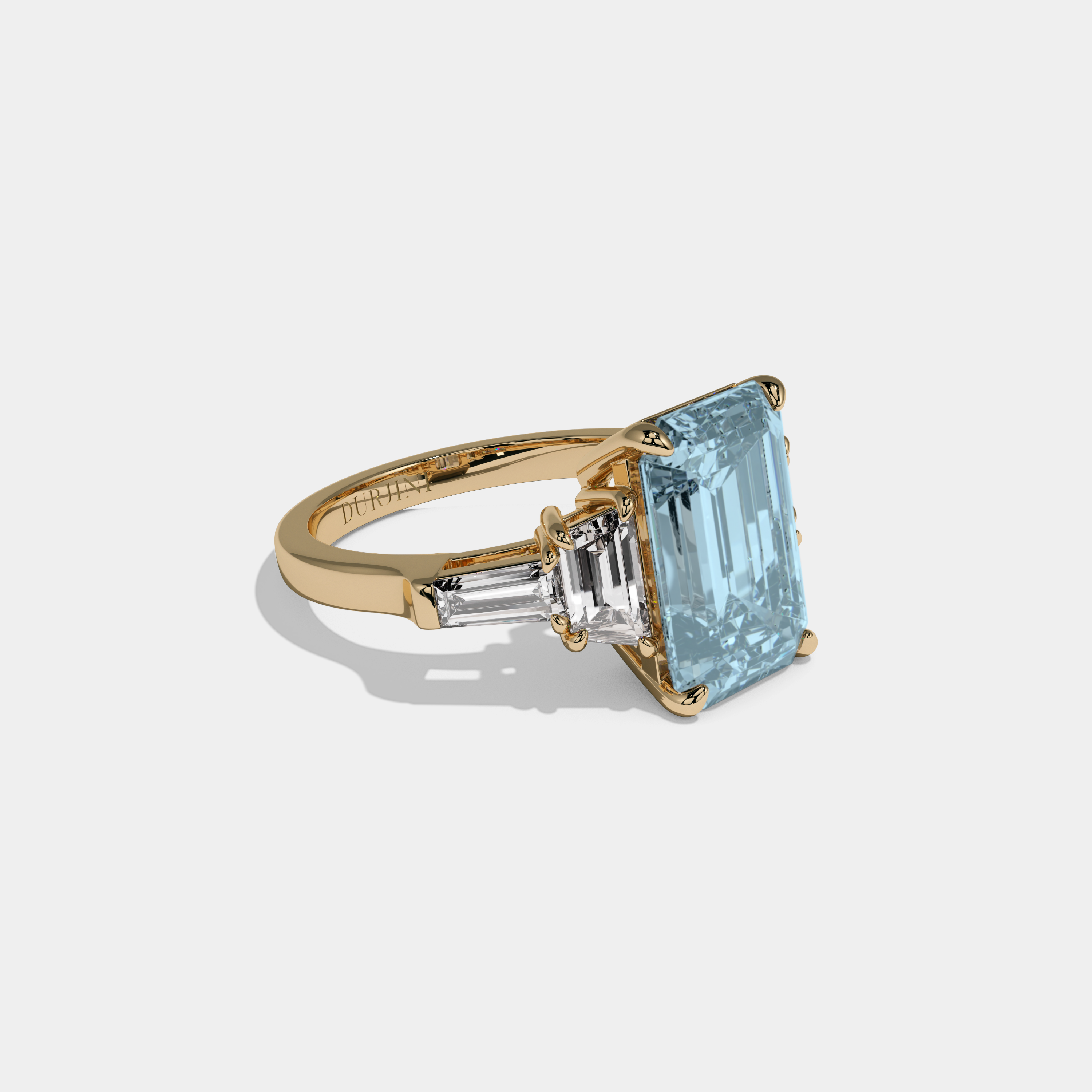 Caroline Fancy Light Blue Emerald Cut Diamond Plain Band With Step Cut Sides Engagement Ring 8ct 18K Yellow Gold