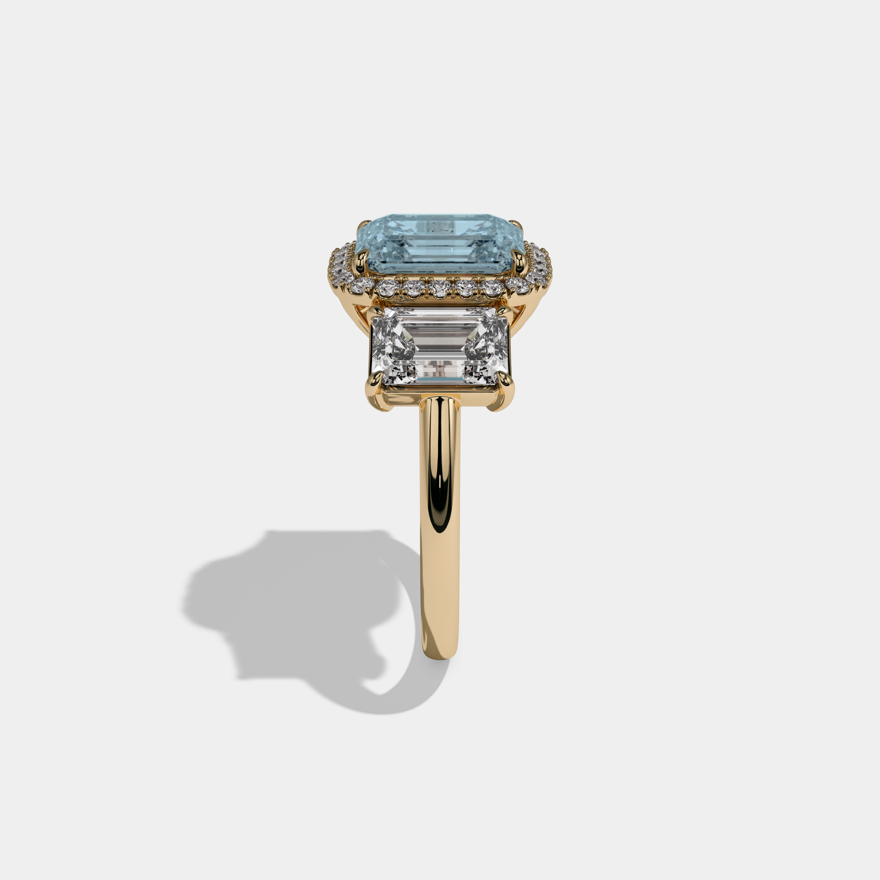 Caroline Fancy Light Blue Emerald Cut Diamond Plain Band With Emerald Cut Sides Engagement Ring 8ct 18K Yellow Gold