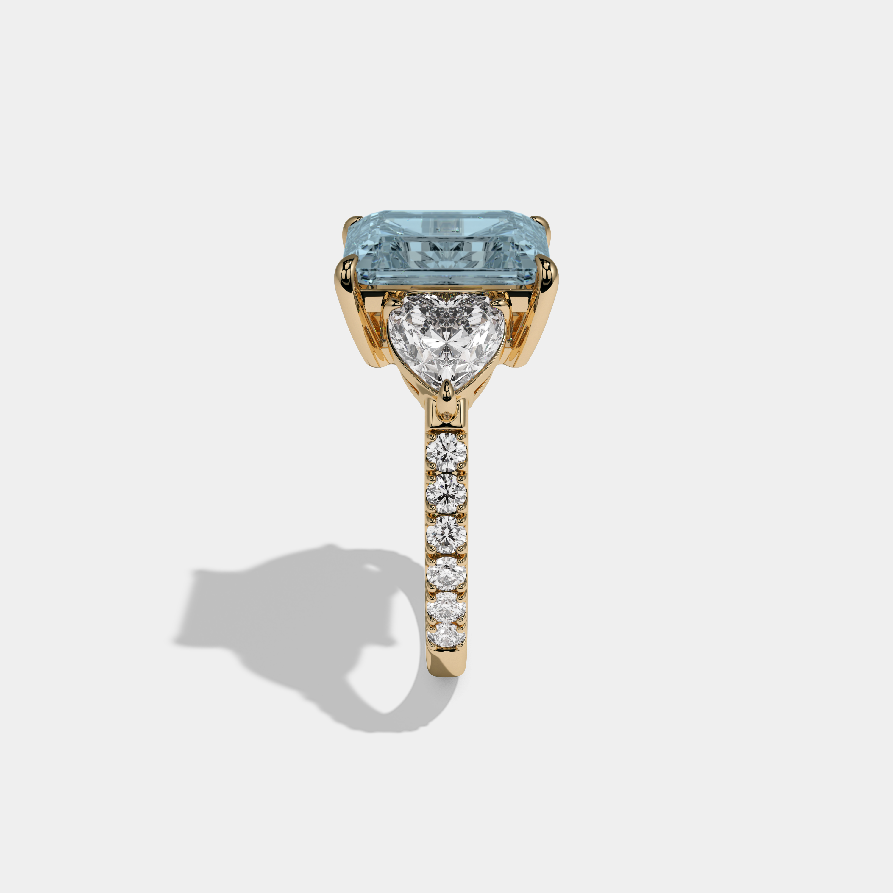 Caroline Fancy Light Blue Emerald Cut Diamond Band With Heart Cut Sides Engagement Ring 8ct 18K Yellow Gold