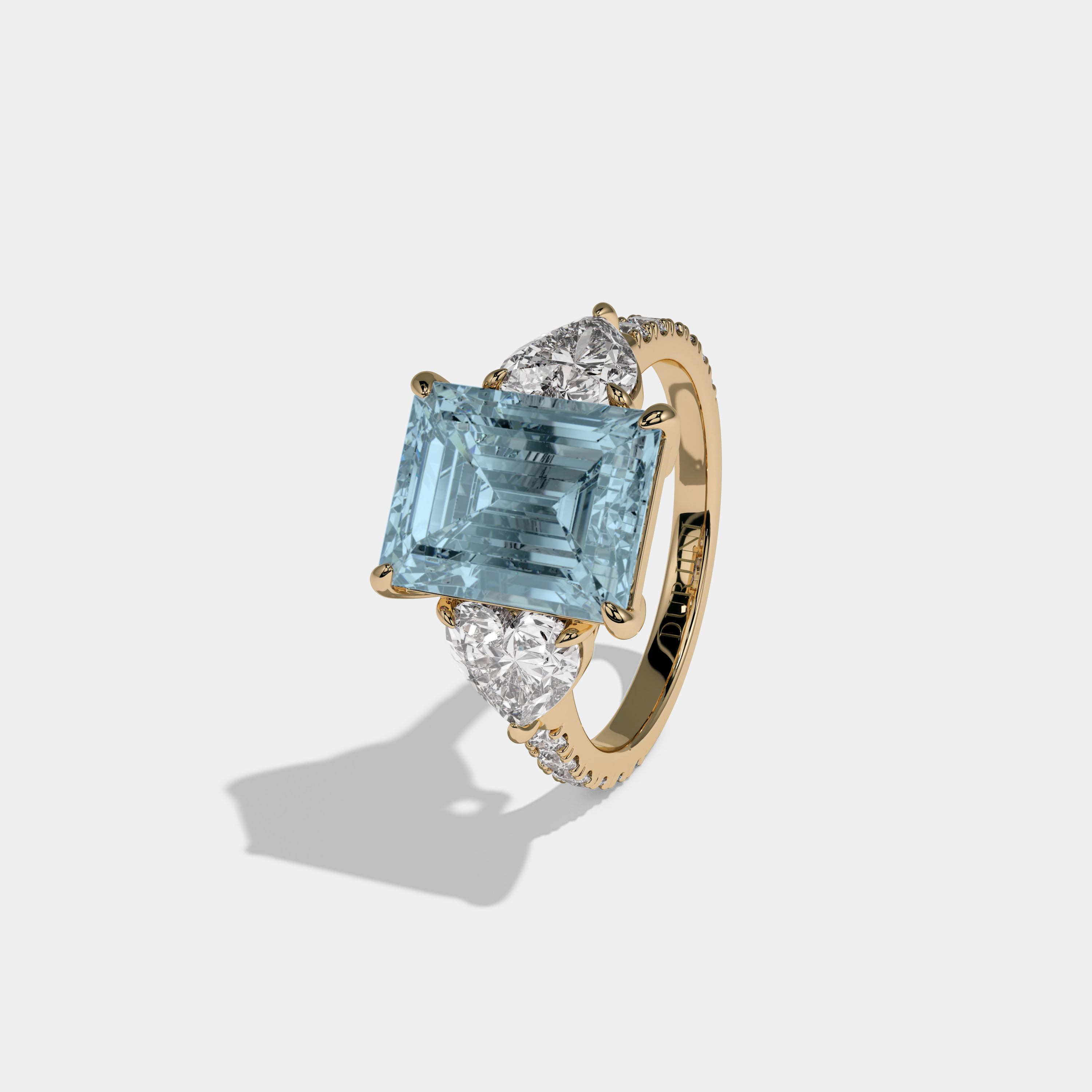 Caroline Fancy Light Blue Emerald Cut Diamond Band With Heart Cut Sides Engagement Ring 8ct 18K Yellow Gold