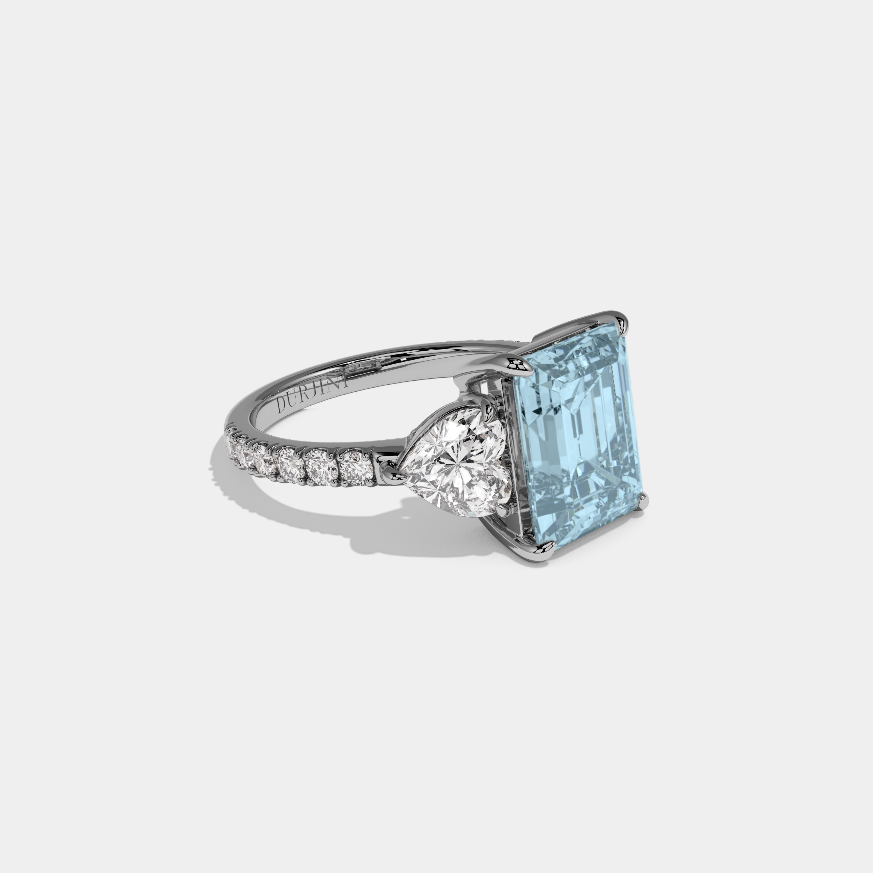 Margaret Fancy Light Blue Emerald Cut Diamond Band With Heart Cut Sides Engagement Ring 8ct 18K White Gold