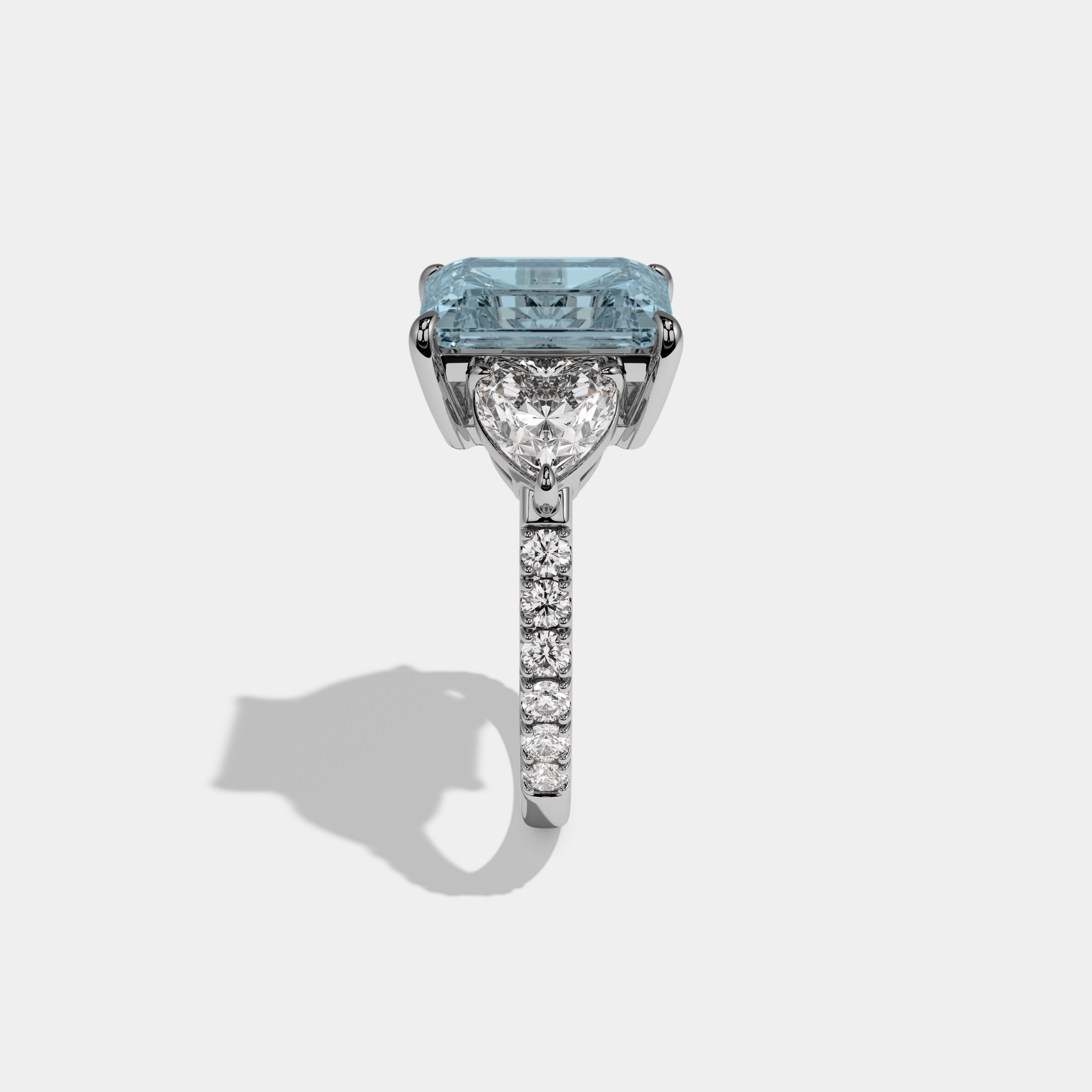 Margaret Fancy Light Blue Emerald Cut Diamond Band With Heart Cut Sides Engagement Ring 8ct 18K White Gold