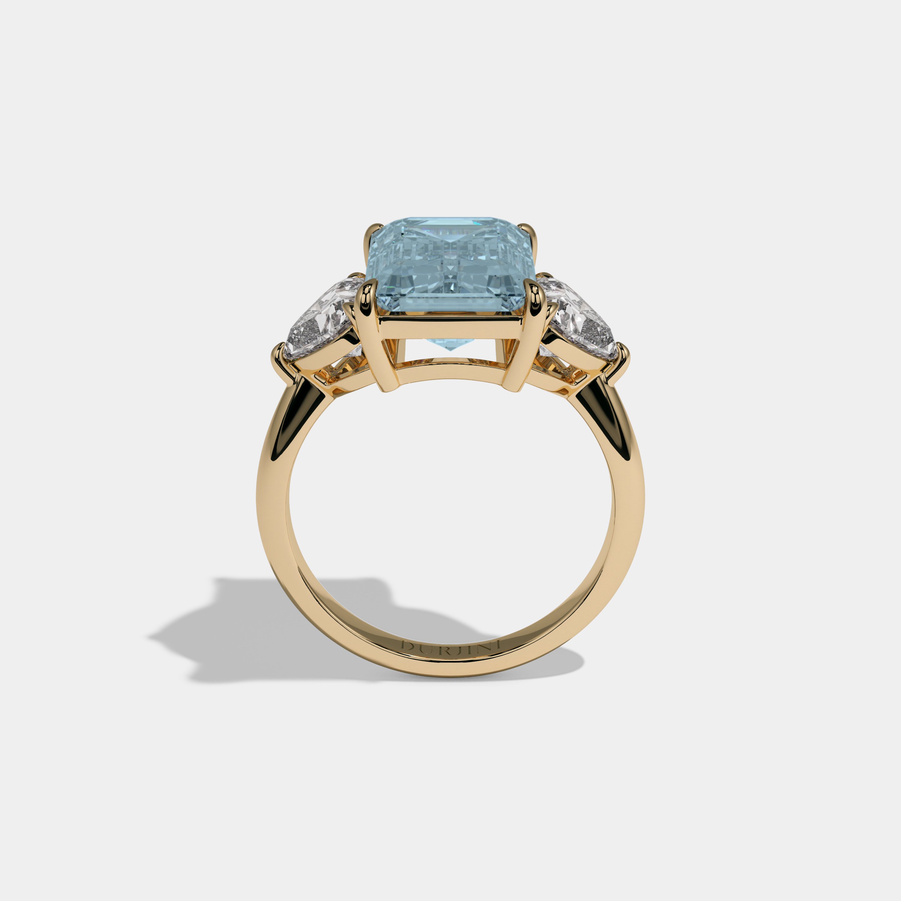 Caroline Fancy Light Blue Emerald Cut Diamond Plain Band With Heart Cut Sides Engagement Ring 8ct 18K Yellow Gold