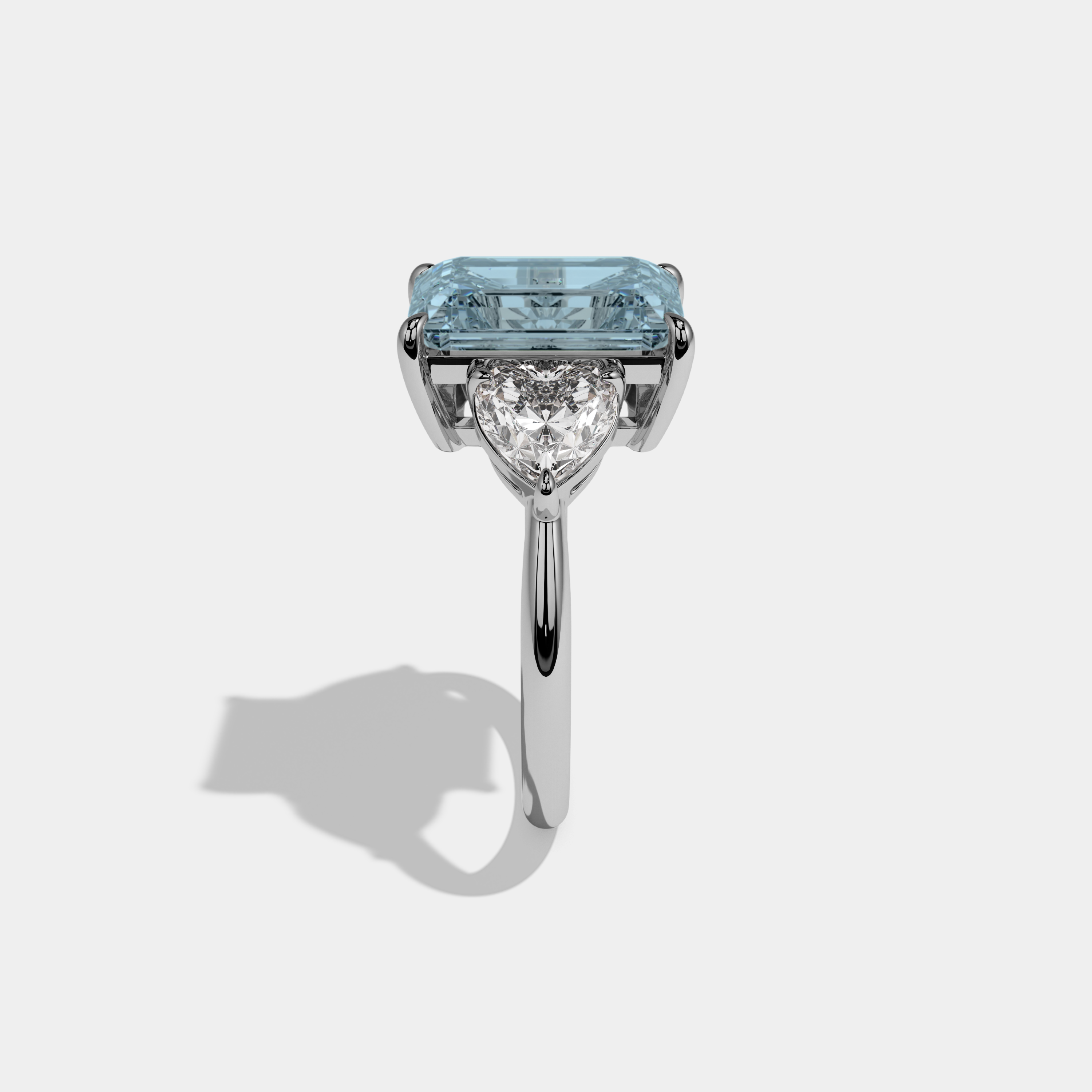 Margaret Fancy Light Blue Emerald Cut Diamond Plain Band With Heart Cut Sides Engagement Ring 8ct 18K White Gold