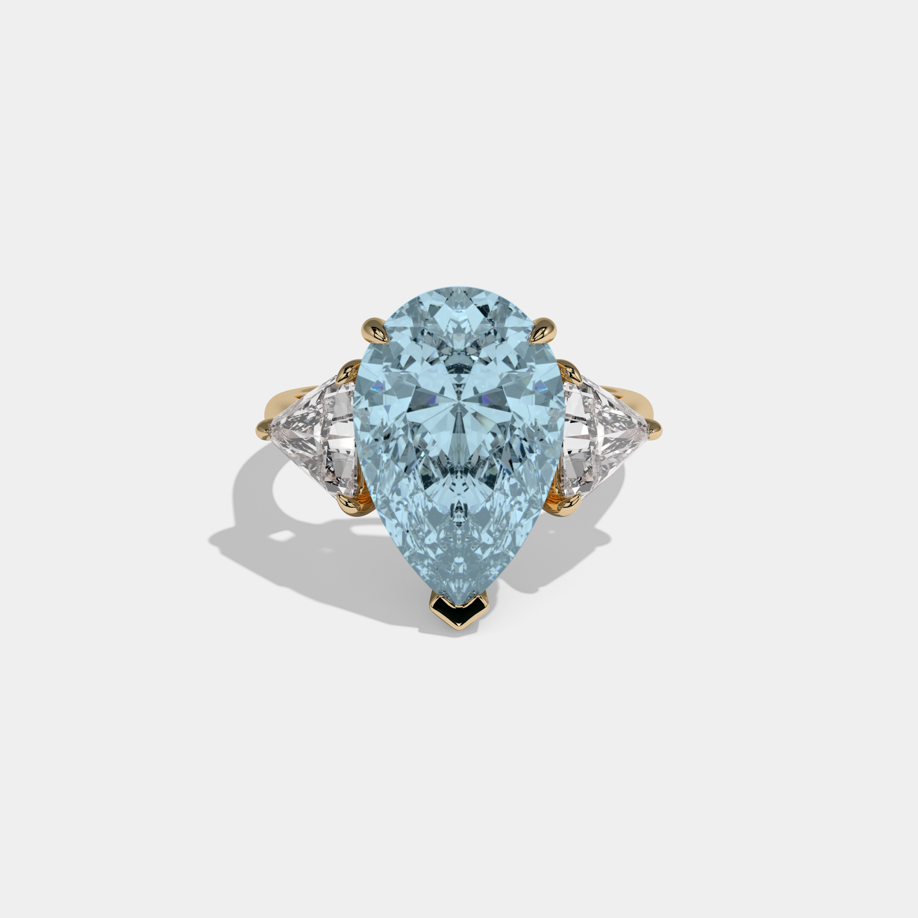 Caroline Fancy Light Blue Pear Cut Diamond Plain Band With Triangle Cut Sides Engagement Ring 8ct 18K Yellow Gold