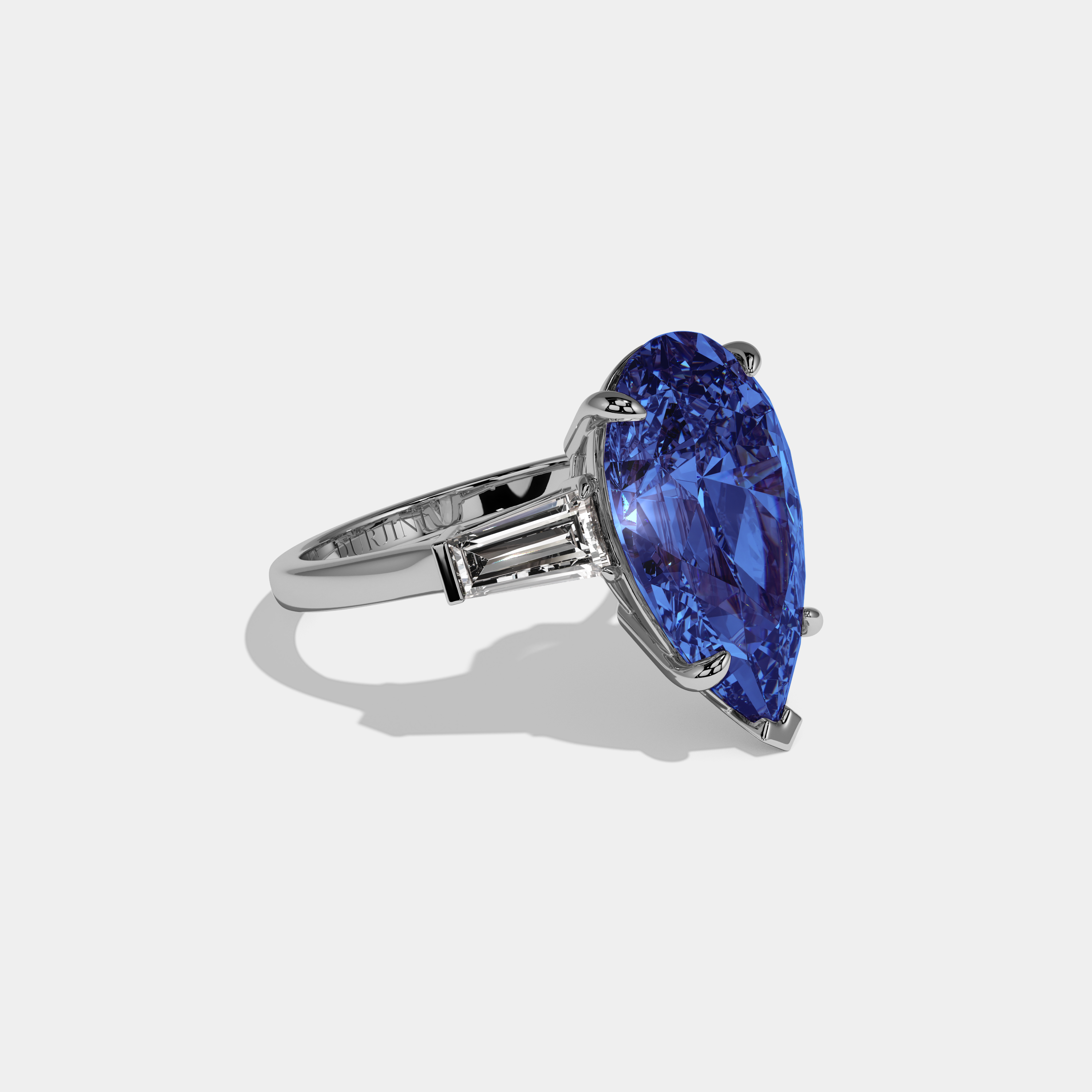 Mary Fancy Dark Blue Pear Cut Diamond Plain Band With Baguette Cut Sides Engagement Ring 8ct 18k White Gold