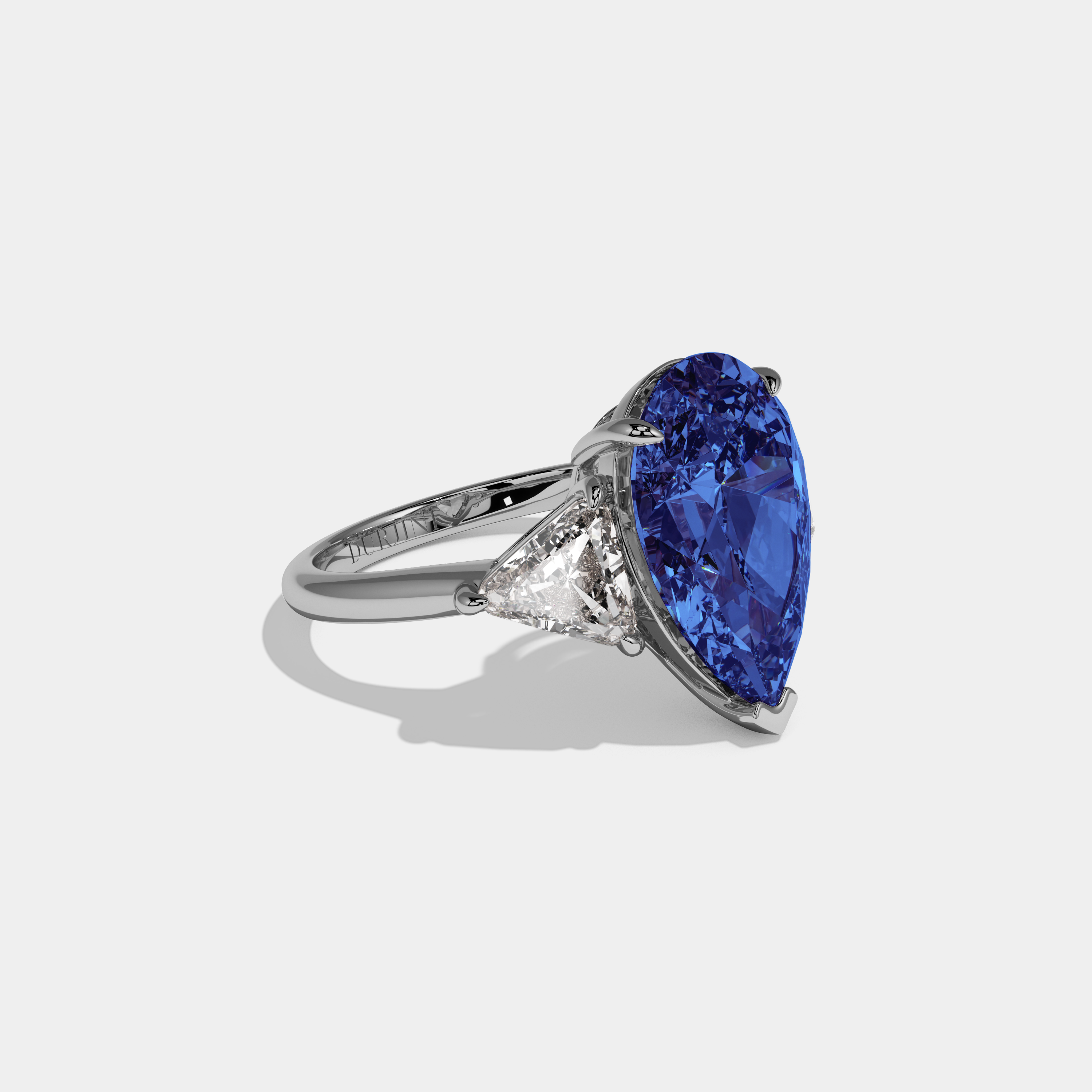 Matilda Fancy Dark Blue Pear Cut Diamond Plain Band With Triangle Cut Sides Engagement Ring 8ct 18K White Gold