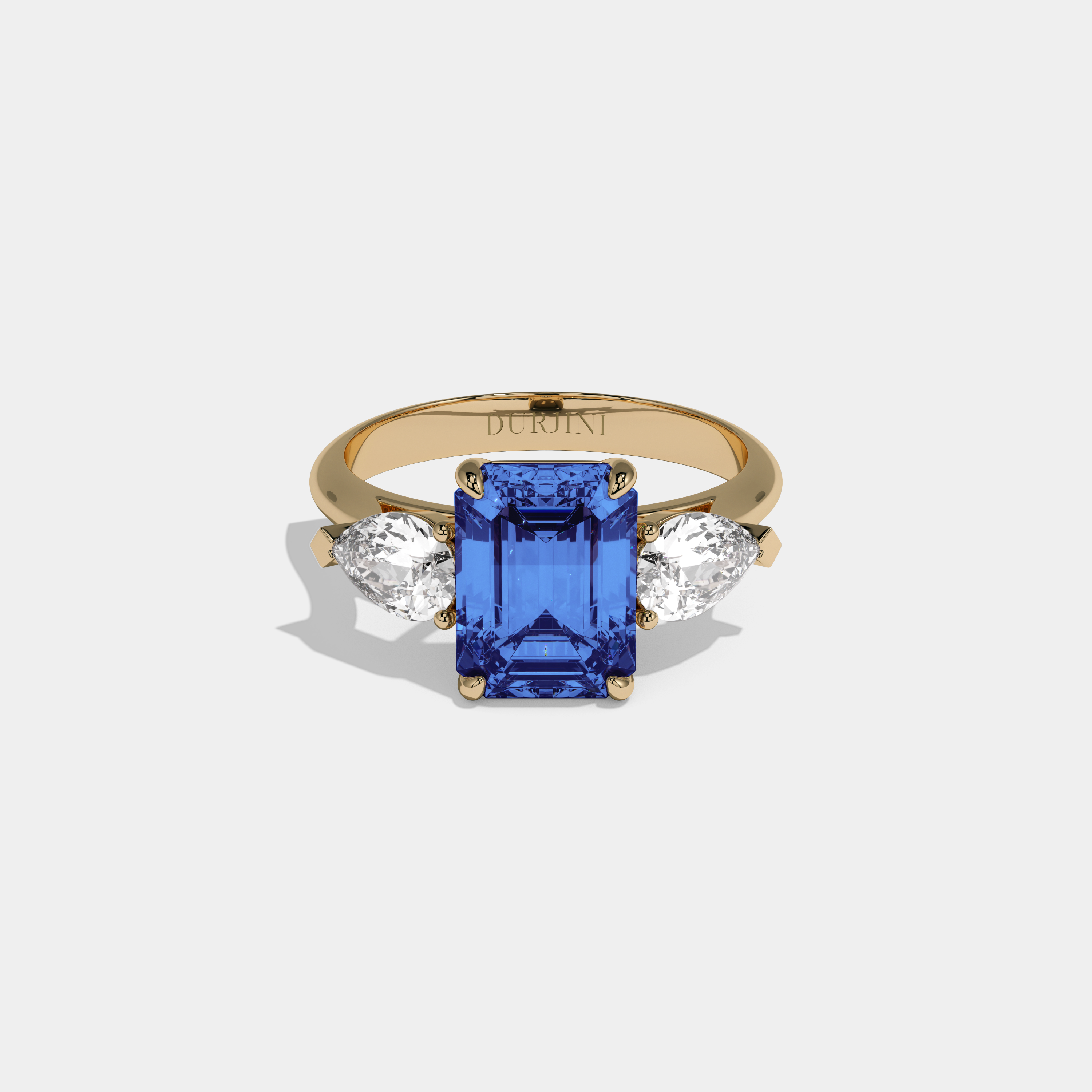 Alexandrina Fancy Dark Blue Emerald Cut Diamond Plain Band With Pear Cut Sides Engagement Ring 6ct 18K Yellow Gold