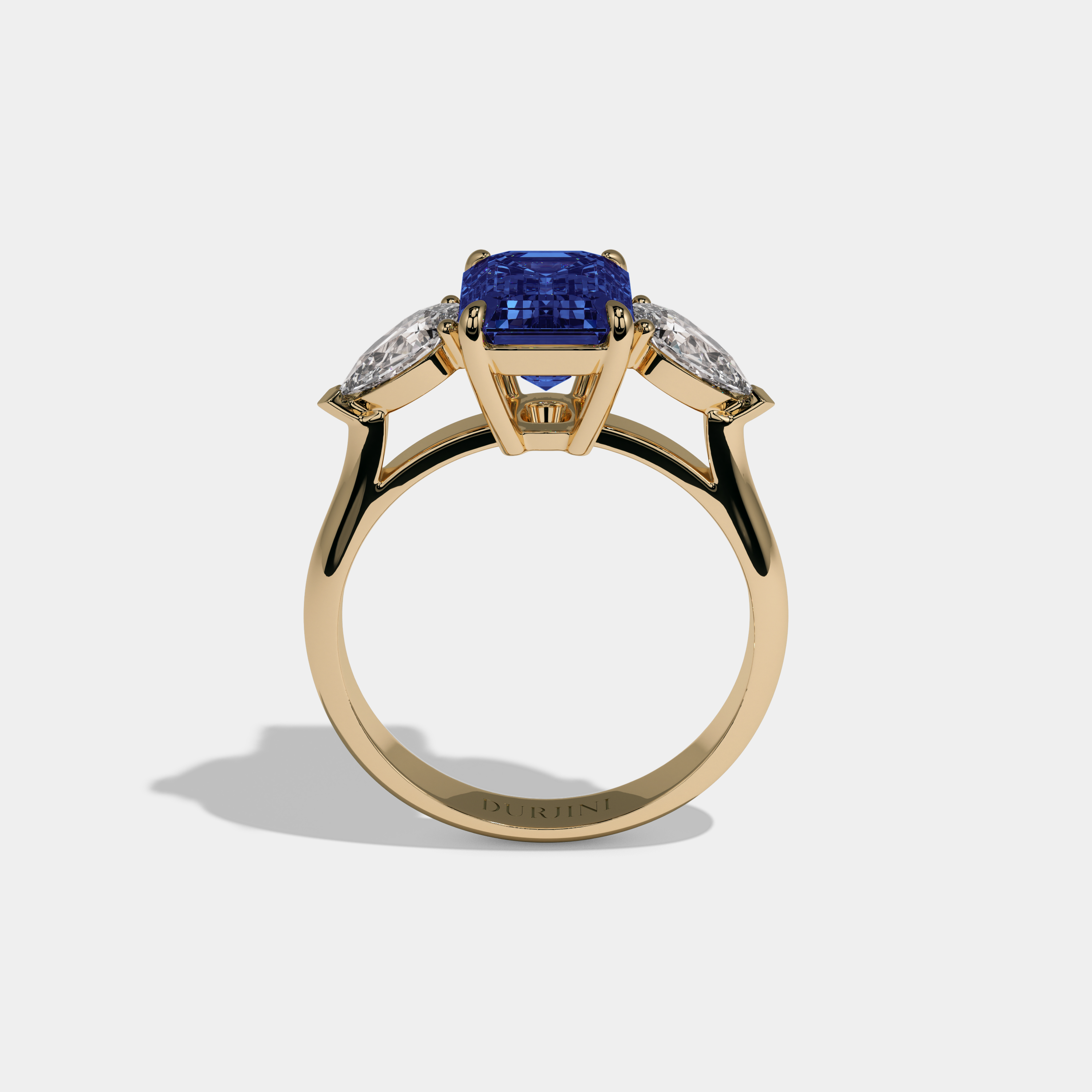 Alexandrina Fancy Dark Blue Emerald Cut Diamond Plain Band With Pear Cut Sides Engagement Ring 6ct 18K Yellow Gold