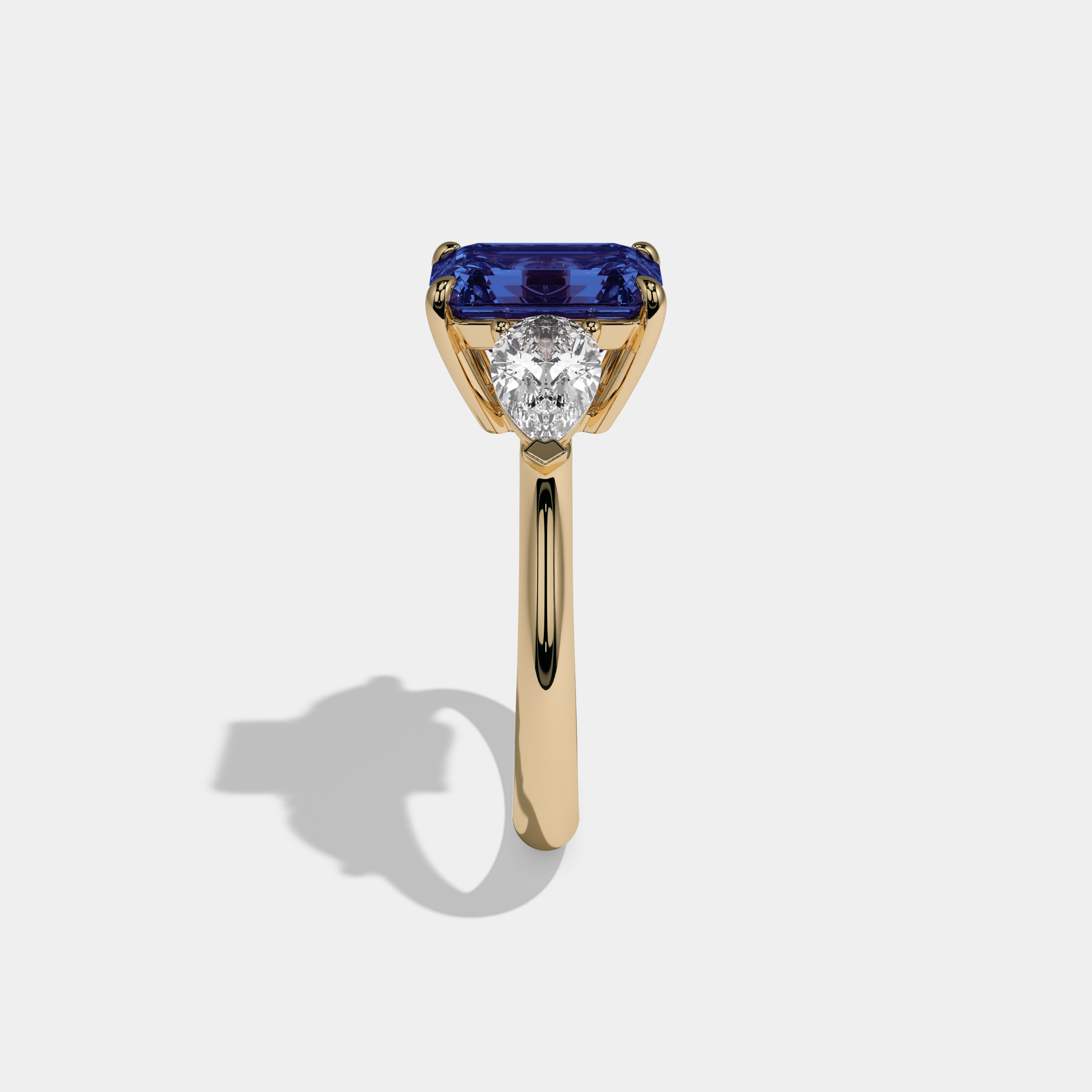 Alexandrina Fancy Dark Blue Emerald Cut Diamond Plain Band With Pear Cut Sides Engagement Ring 6ct 18K Yellow Gold
