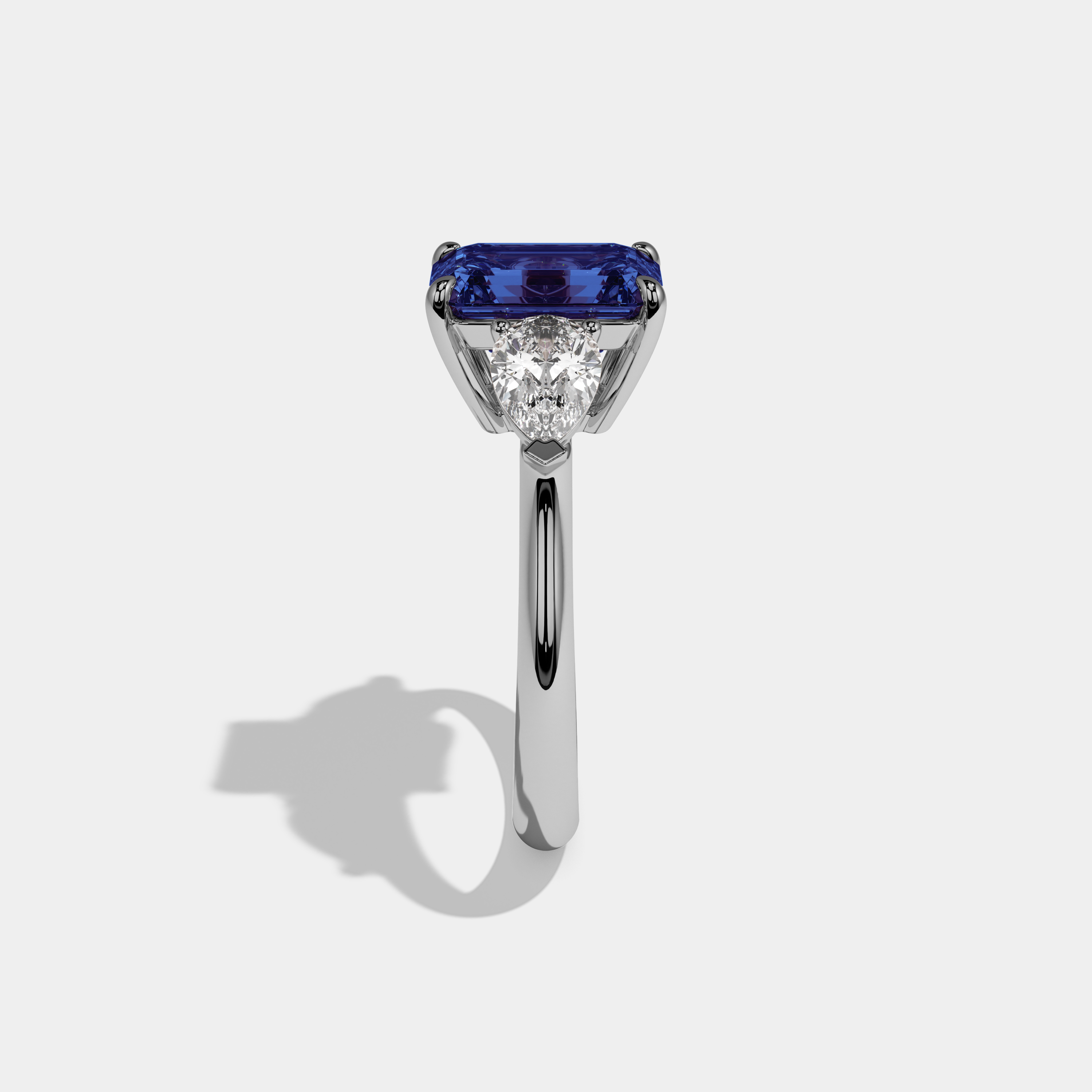 Sophronia Fancy Dark Blue Emerald Cut Diamond Plain Band With Pear Cut Sides Engagement Ring 6ct 18K White Gold