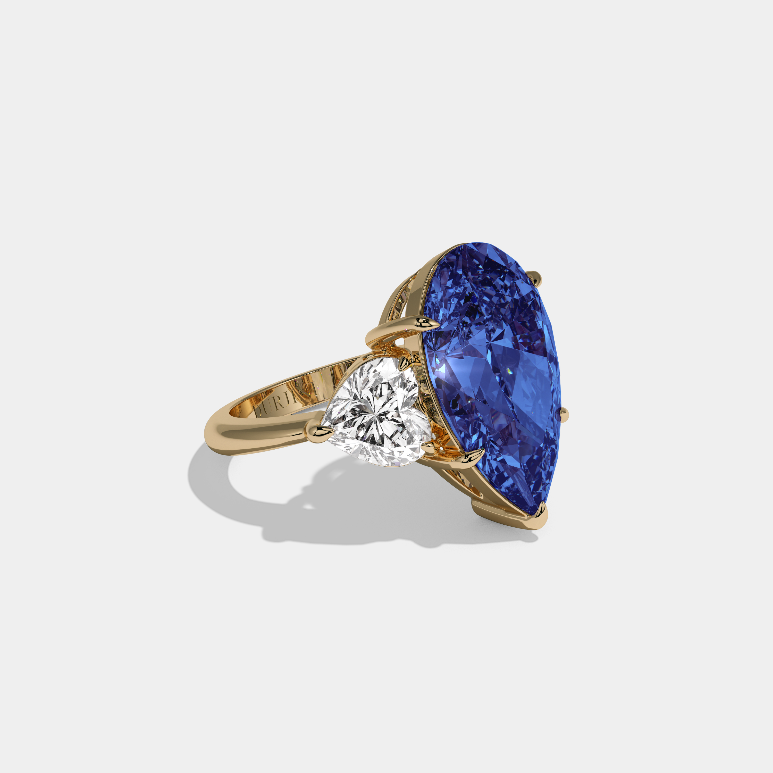 Diana Fancy Dark Blue Pear Cut Diamond Plain Band With Heart Cut Sides Engagement Ring 6ct 18K Yellow Gold