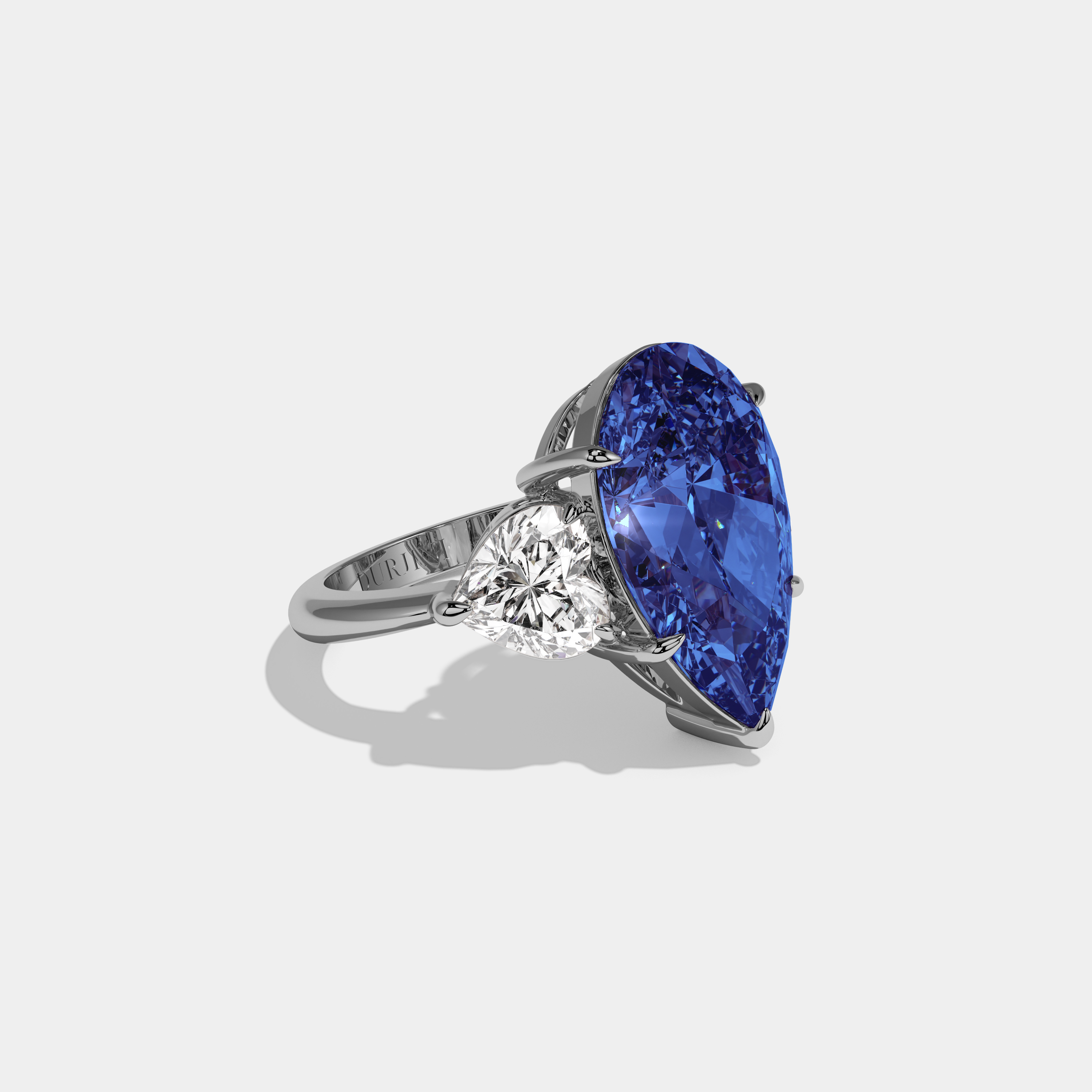 Catherine Fancy Dark Blue Pear Cut Diamond Plain Band With Heart Cut Sides Engagement Ring 6ct 18K White Gold