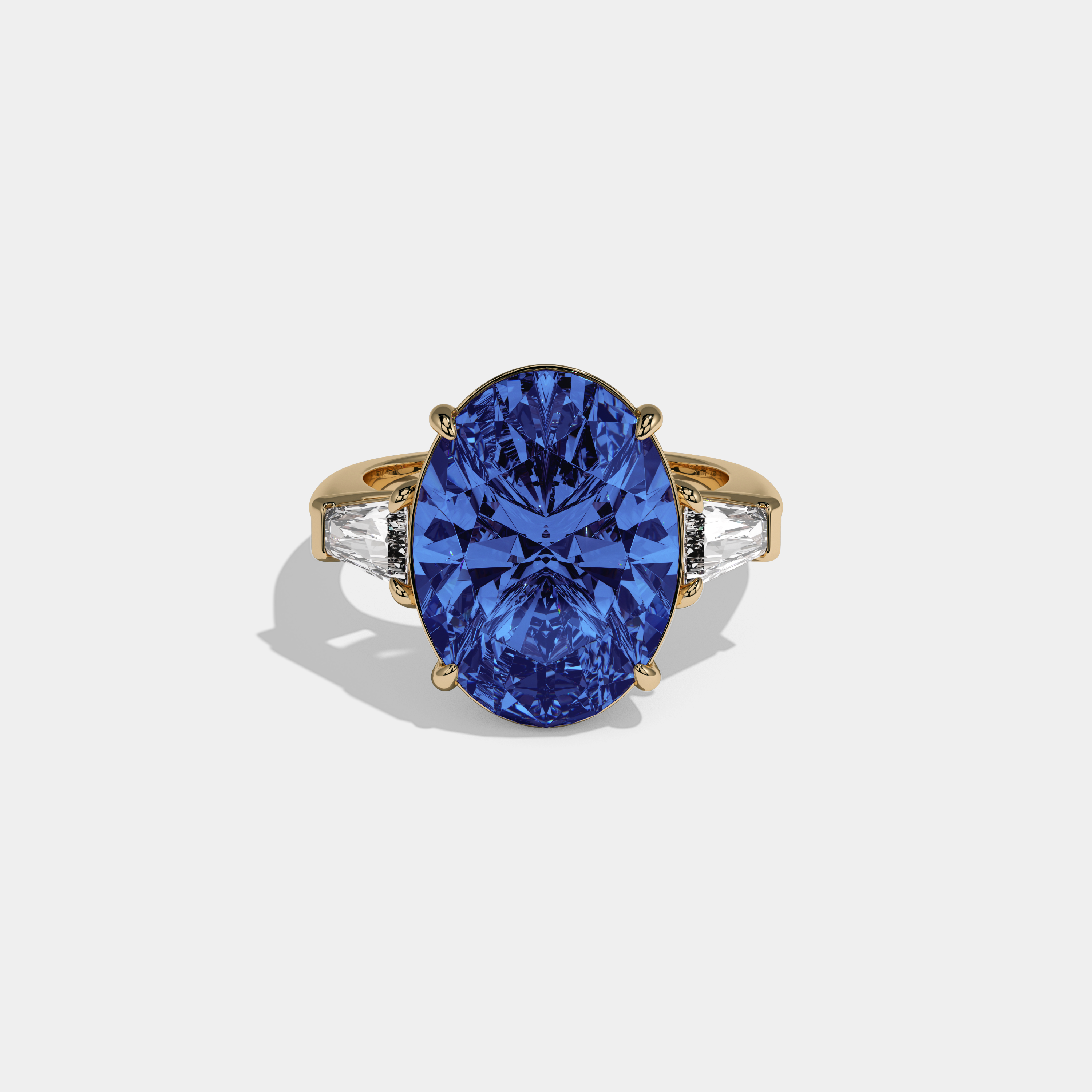 Caroline Fancy Dark Blue Oval Cut Diamond Plain Band With Tapered Baguette Cut Sides Engagement Ring 8ct 18K Yellow Gold