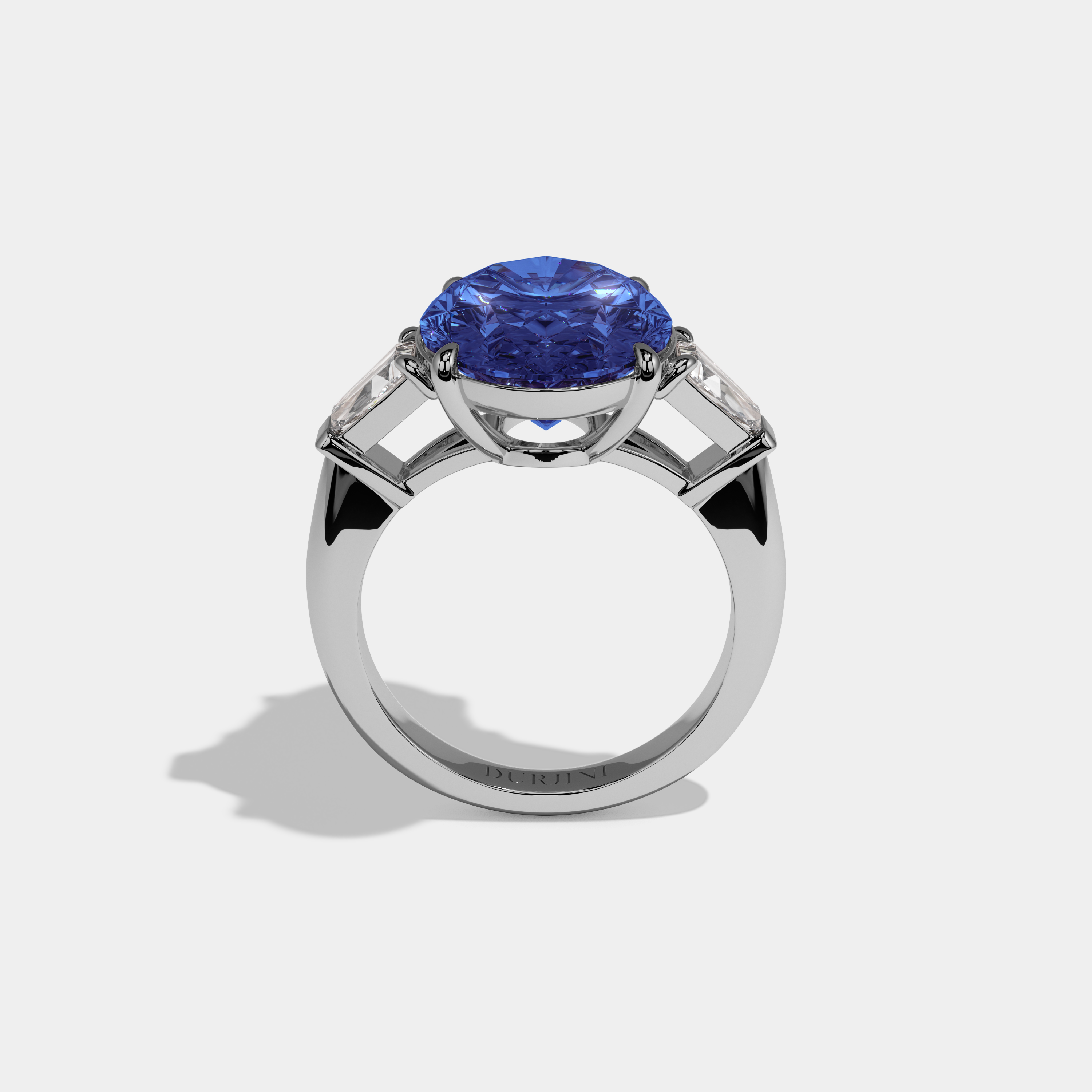 Elizabeth Fancy Dark Blue Oval Cut Diamond Plain Band With Tapered Baguette Cut Sides Engagement Ring 8ct 18K White Gold
