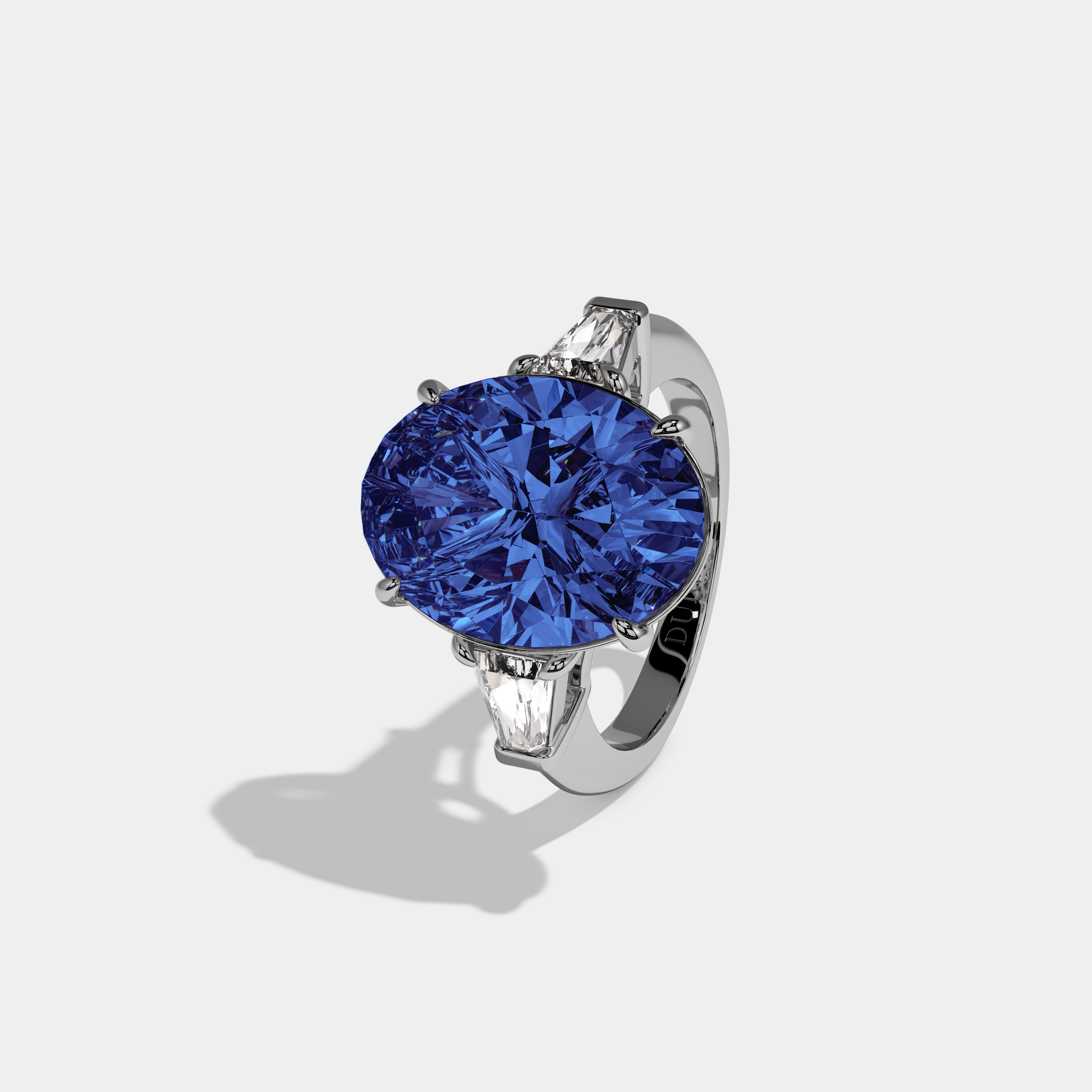 Elizabeth Fancy Dark Blue Oval Cut Diamond Plain Band With Tapered Baguette Cut Sides Engagement Ring 8ct 18K White Gold
