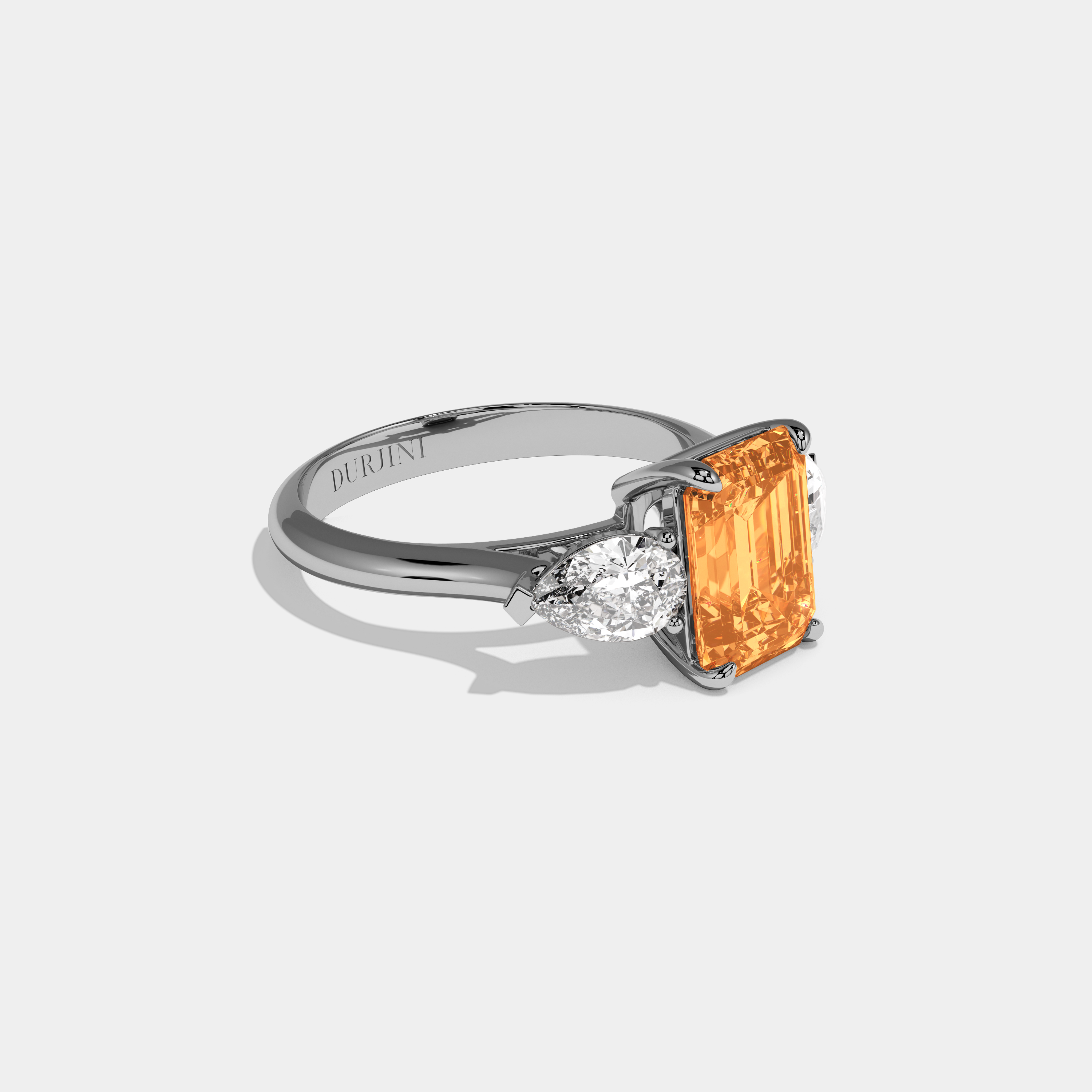 Imogene Fancy Orange Emerald Cut Diamond Plain Band With Pear Cut Sides Engagement Ring 6ct 18K White Gold
