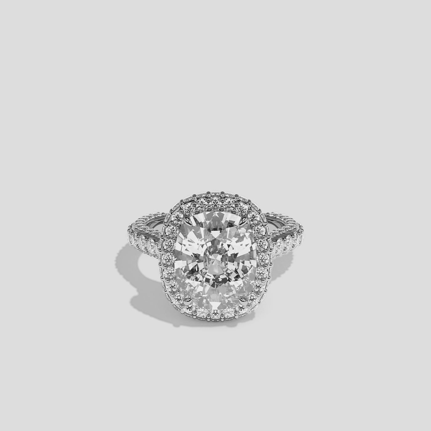 Shira diamond cushion halo engagement ring in 18K white gold by Kurbãni Durjini, 360-degree view
