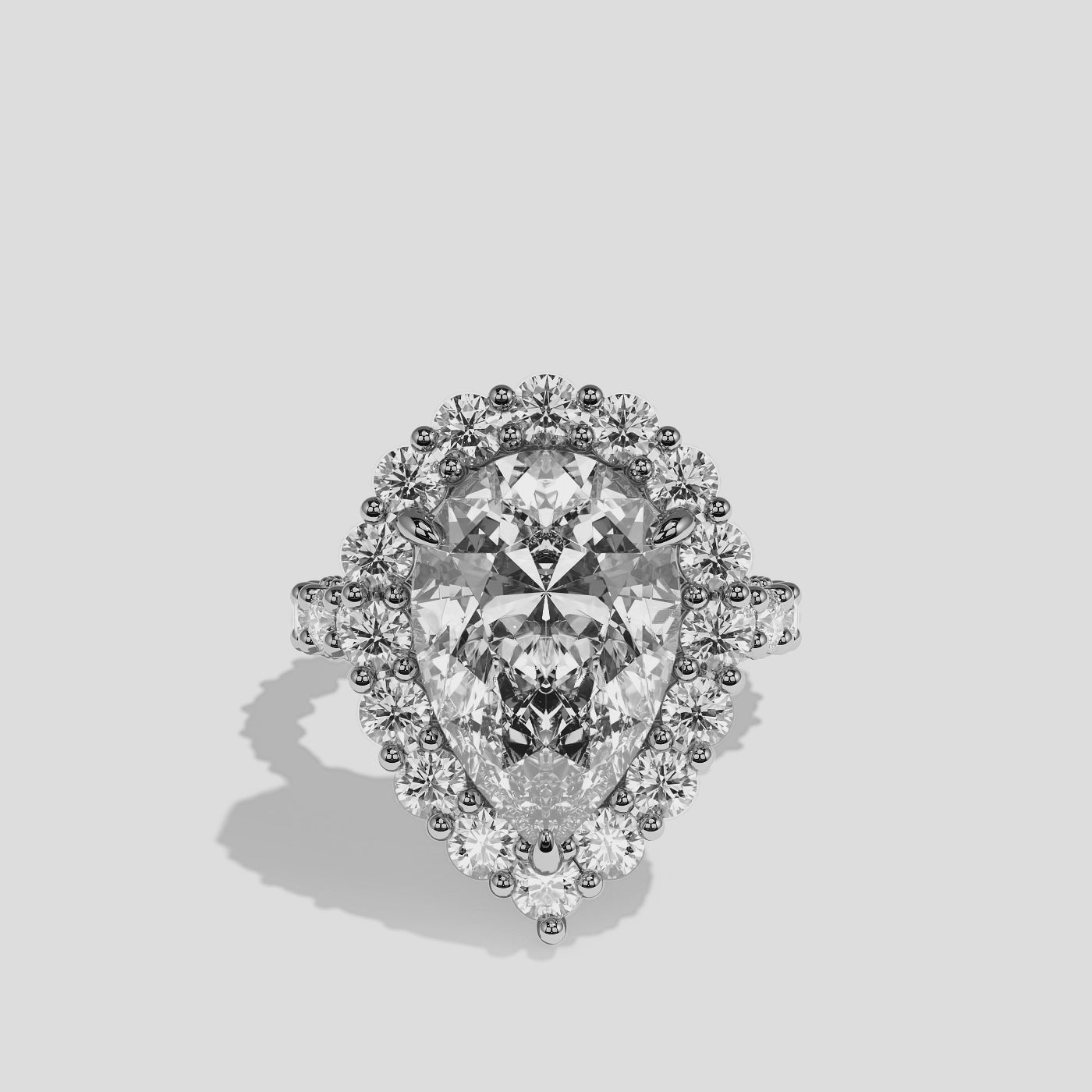 Judith diamond pear halo engagement ring in 18K white gold by Kurbãni Durjini, 360-degree view